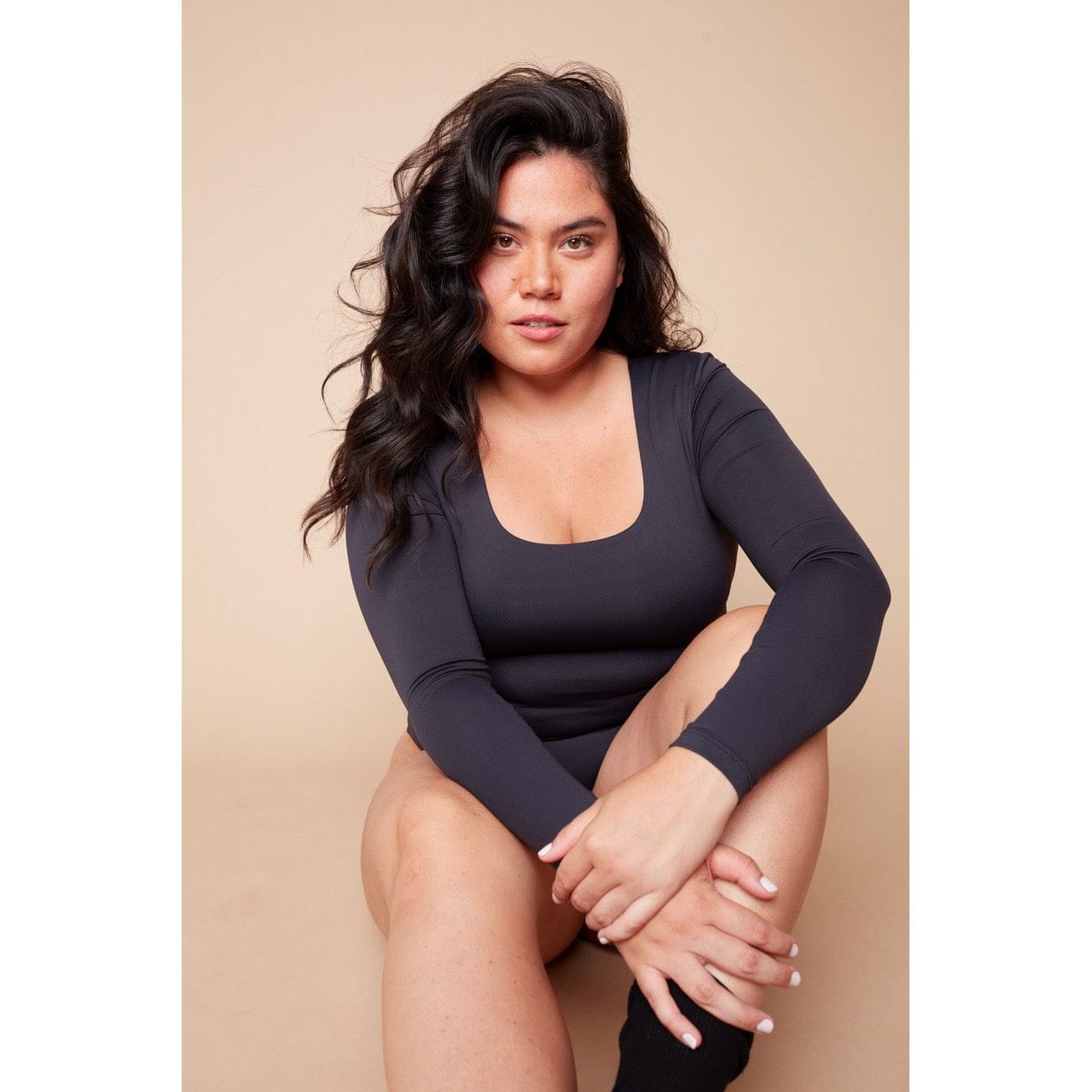 RD Second Skin Sofie Scoopneck Long Sleeve Bodysuit Second Skin Bodysuit with a scoopfront and  a thong back has double-layer fabric for a smooth and structured fit. It's made with RD Style’s signature Contour — luxe, ultra-flattering fabric coveted for its