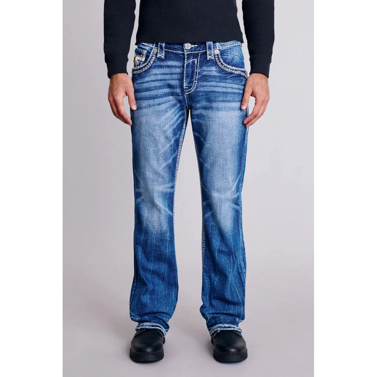Stylish medium indigo Rock Revival Finnley B200 Bootcut jeans, crafted for comfort and a flattering fit.