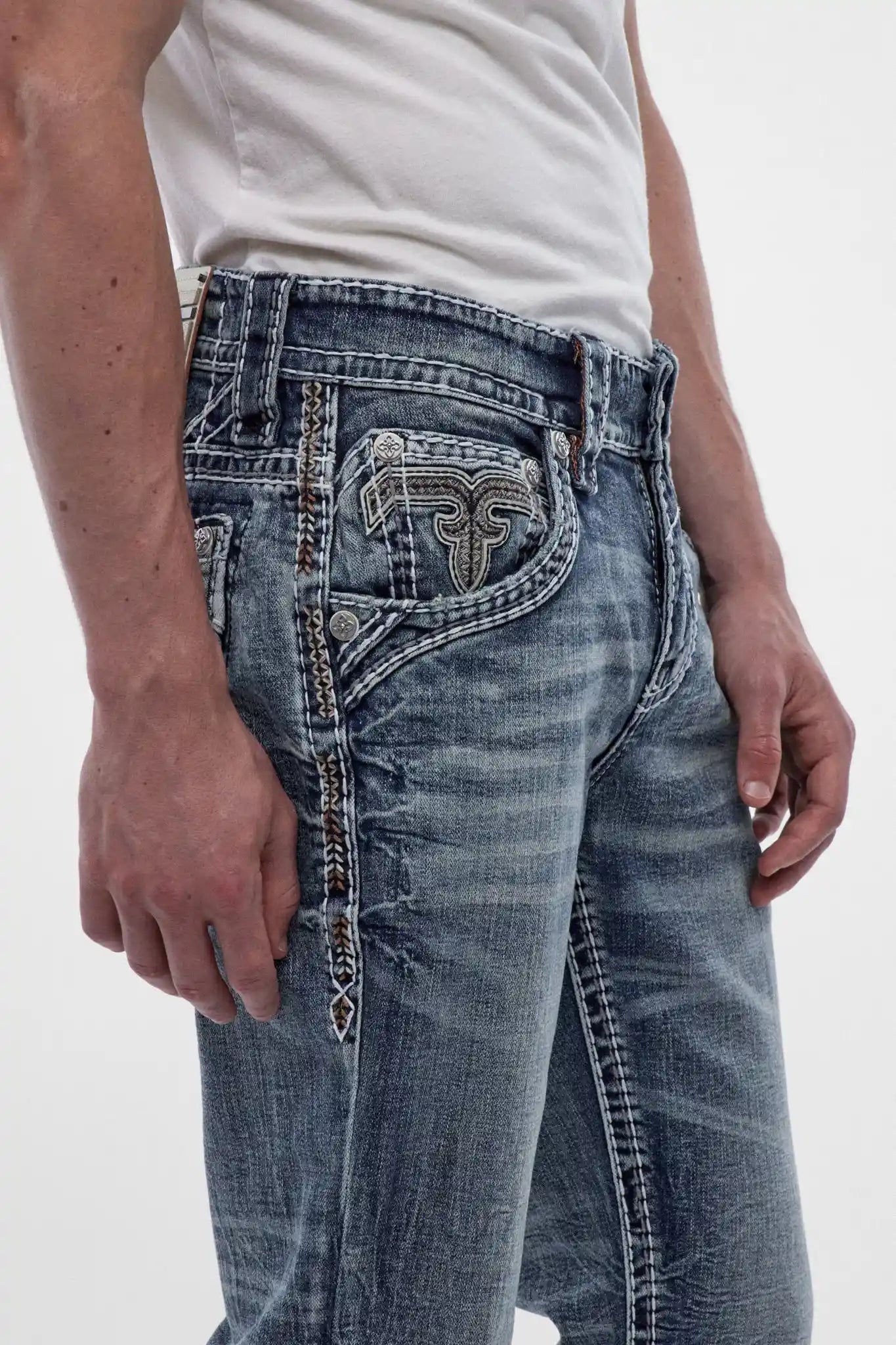 Rock Revival George B202 bootcut jeans in medium blue wash, featuring decorative side stitching and signature back pocket embroidery.