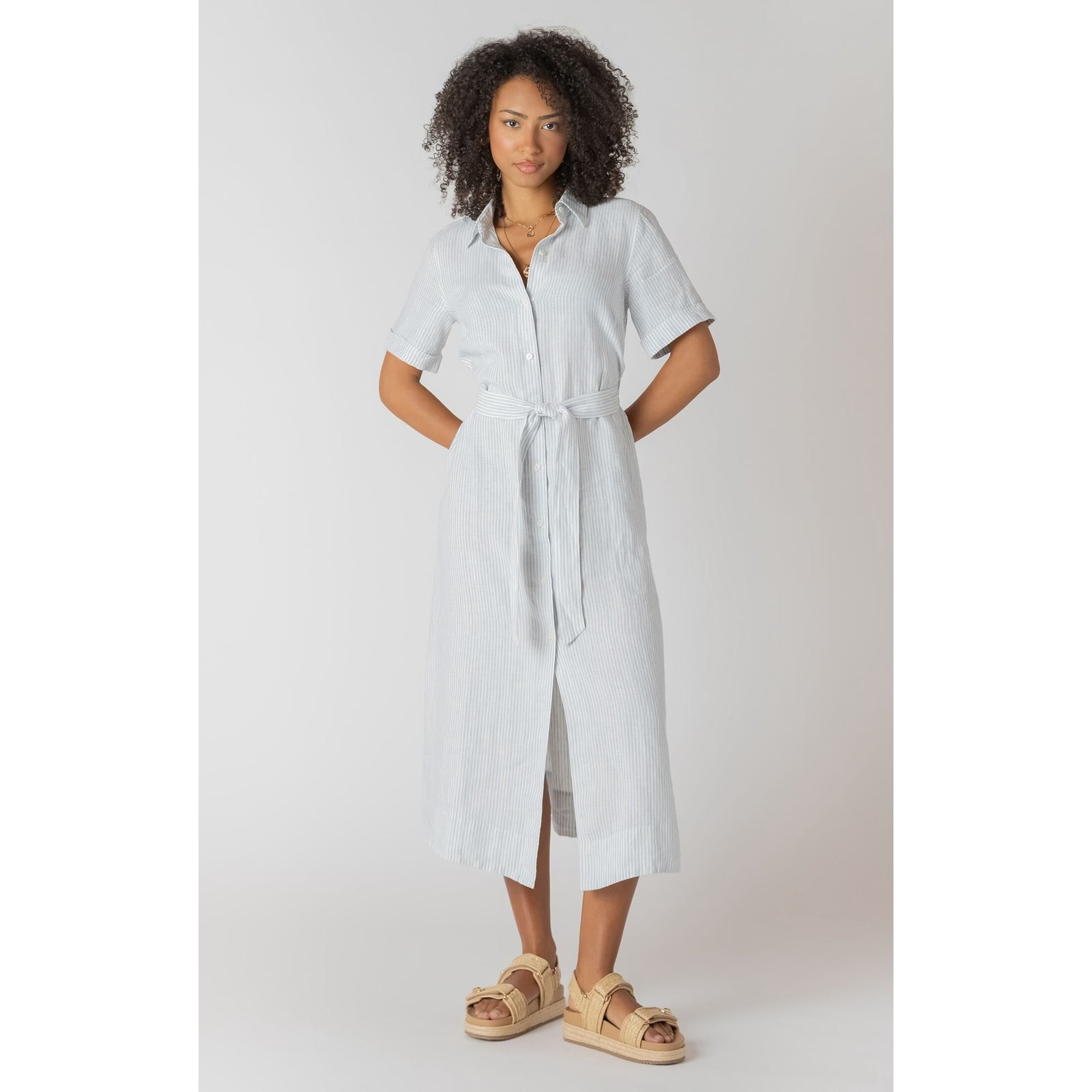 Room 34 Belted Shirtdress in light blue stripe, midi length, V-neck wrap neckline, short rolled sleeves, tied waist.