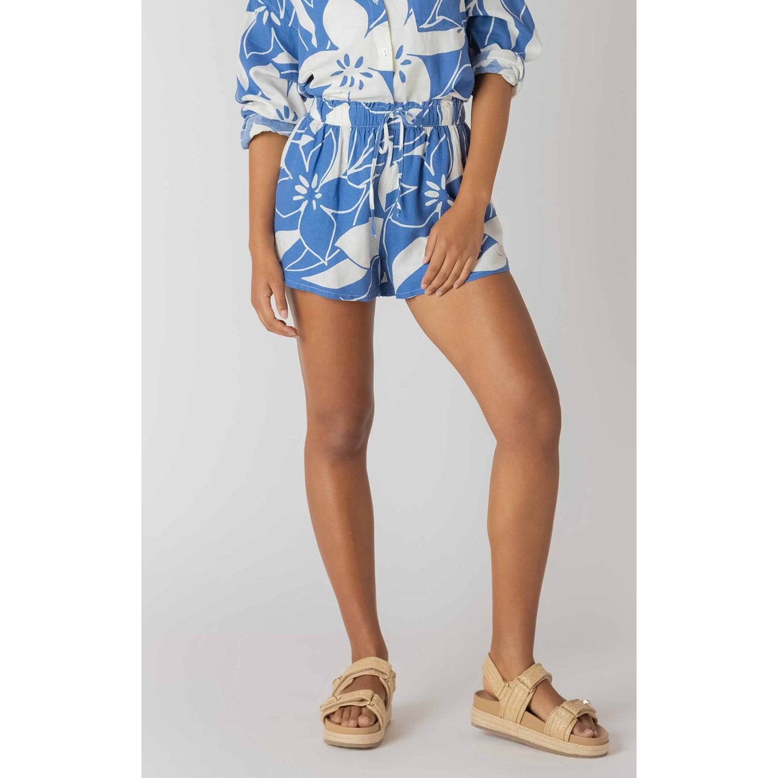 Room 34 Elastic Waist Shorts in Azure Floral with a breezy blue floral print and an elastic drawstring waist.