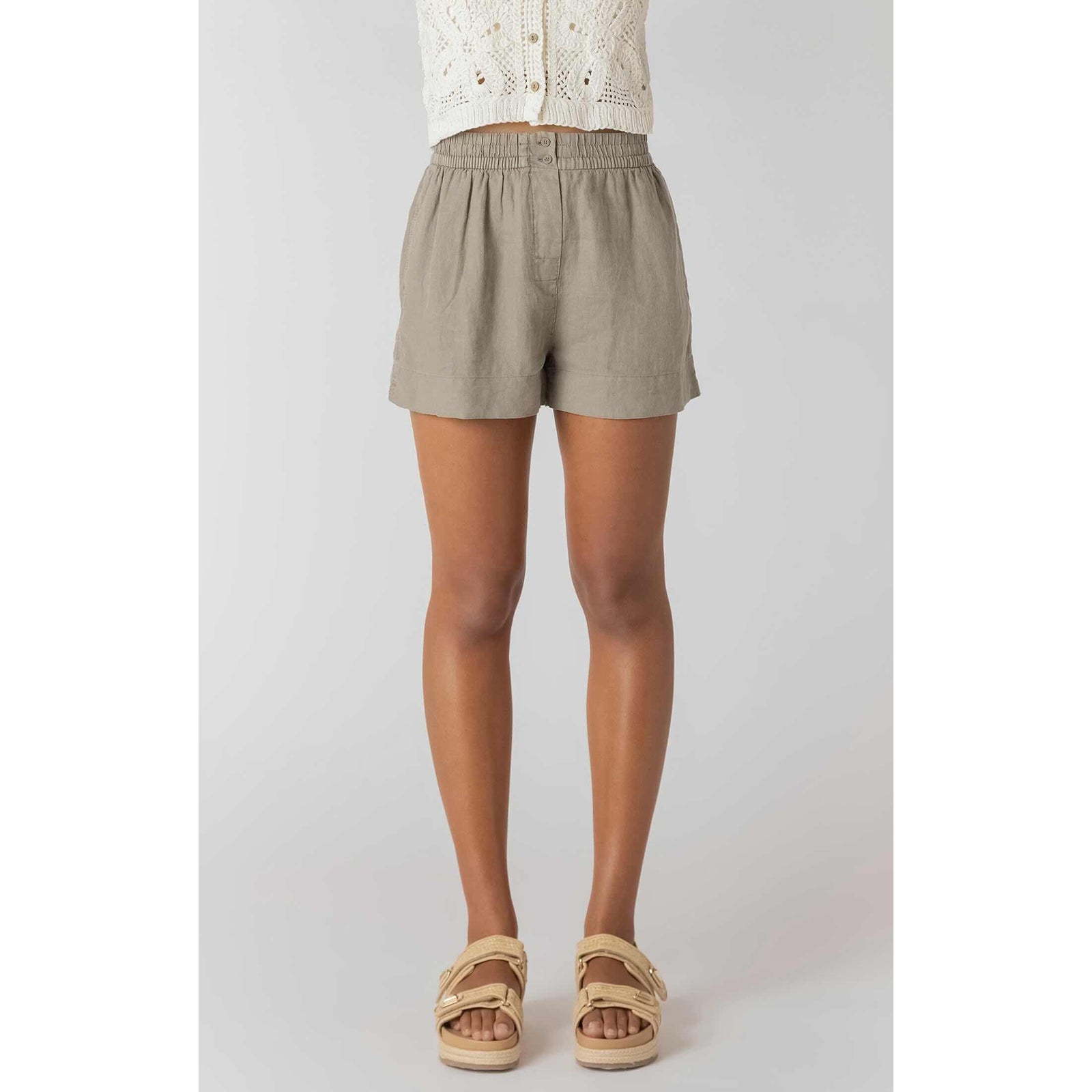 Room 34 Mid-rise Shorts in taupe, woven, mid-rise relaxed fit on model with white top and sandals.