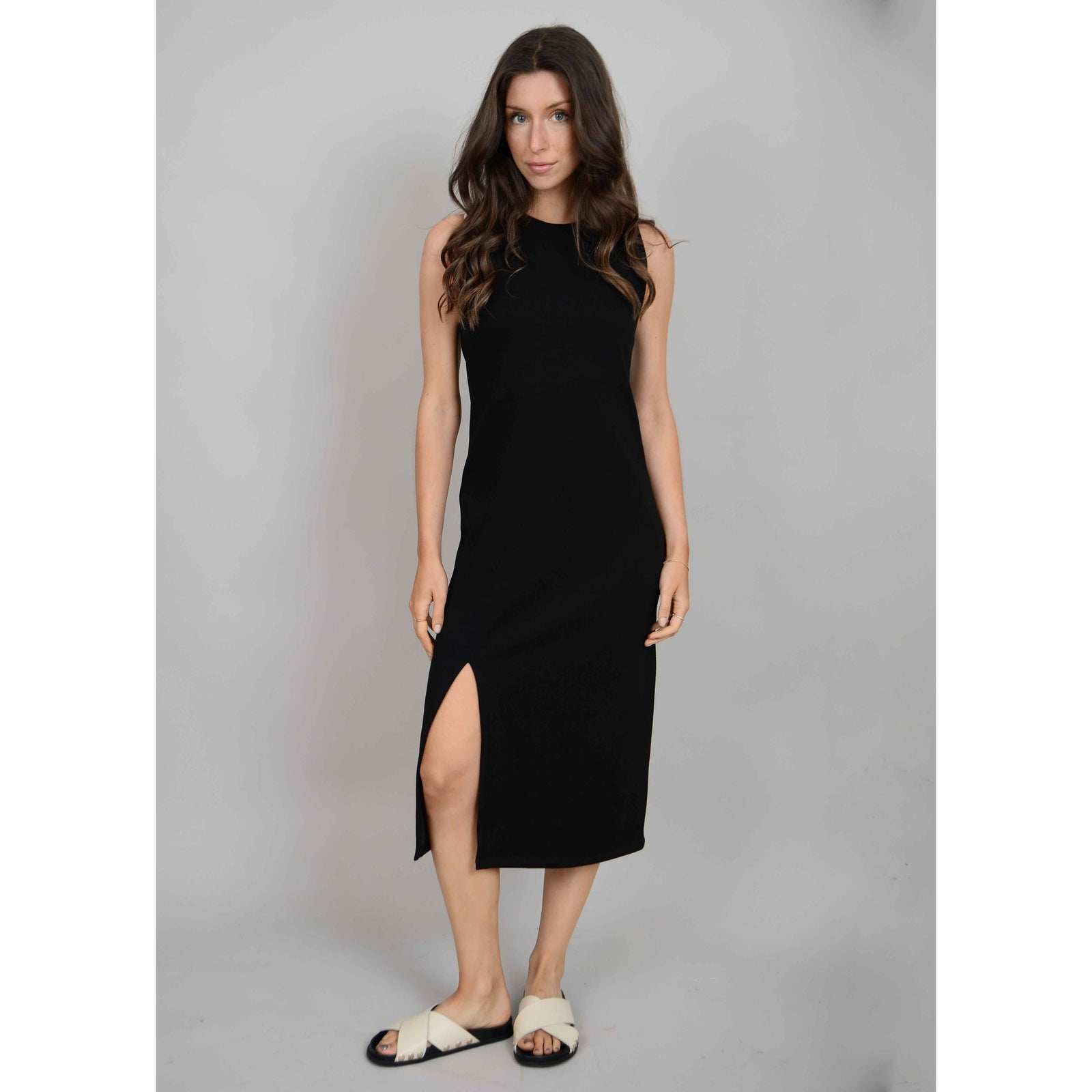 Stylish model showcasing the Scuba Adina Soft Knit Sleeveless Dress, perfect for summer adventures in comfort.