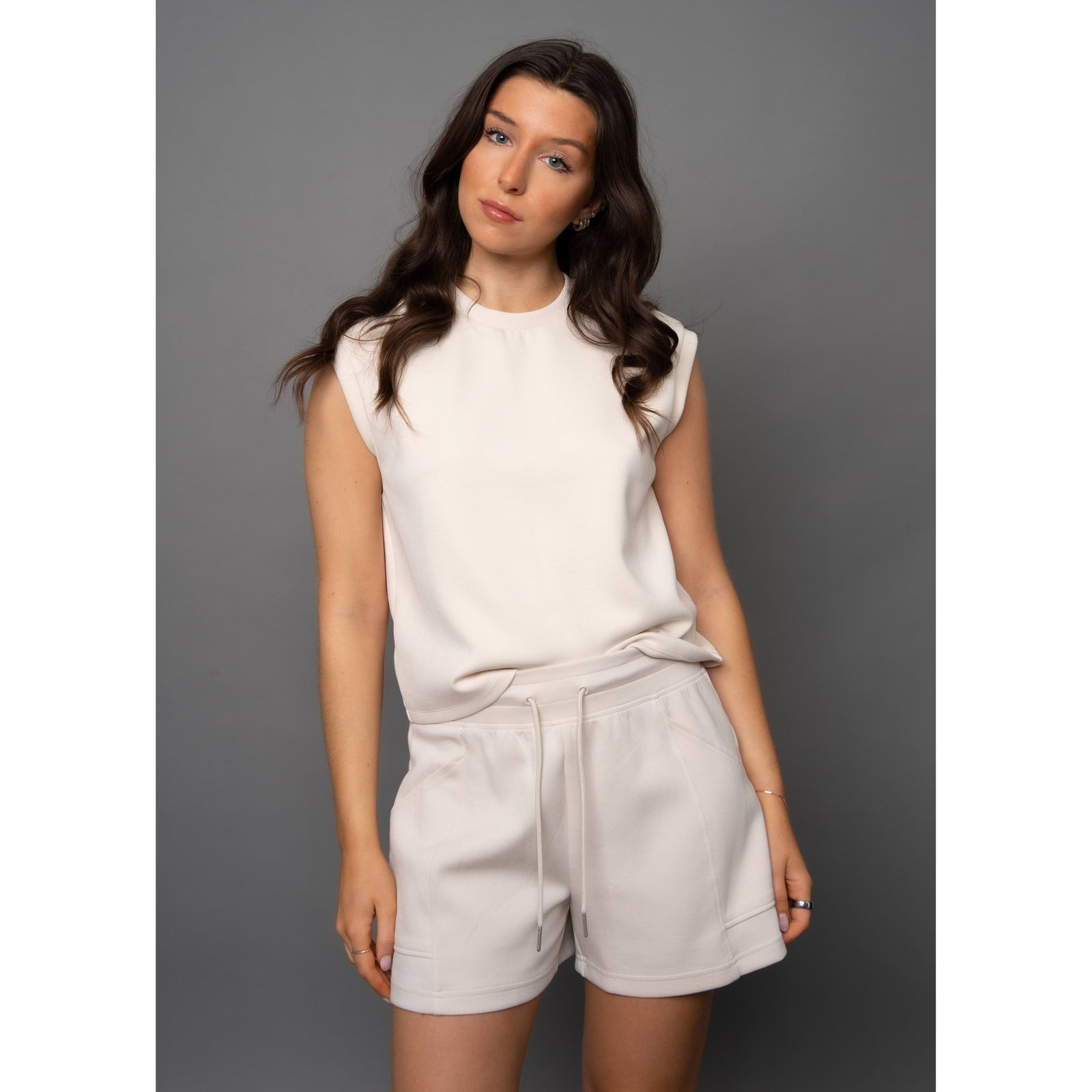 Scuba Miva Soft Knit Tank Top in cream, perfect for comfort and styled with matching shorts for a chic look.