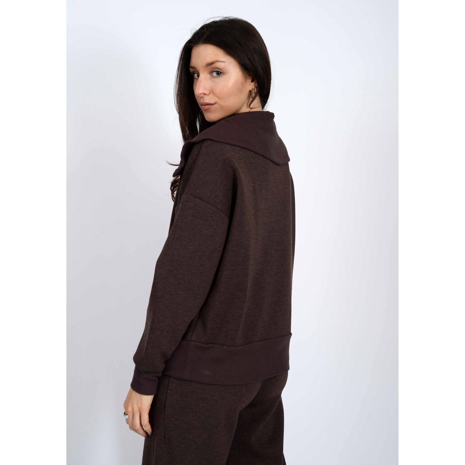 Scuba Sean Soft Knit Half Zip Pullover in umber worn by a model, cozy brown knit hoodie.