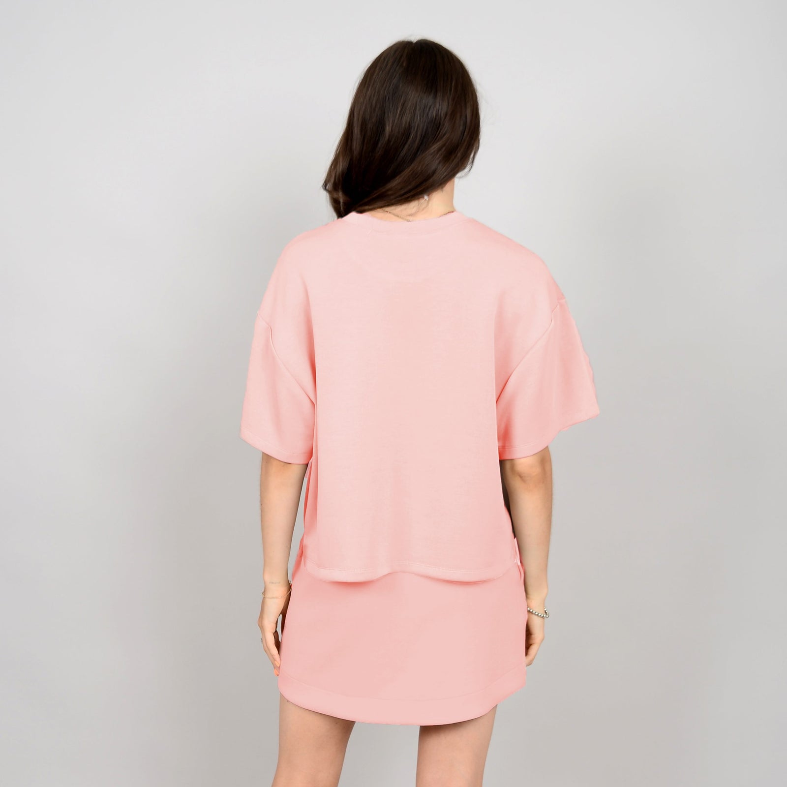 Soft and comfortable Scuba Tess Soft Knit Top in dusty peach, perfect for pairing with denim or as a cute set.