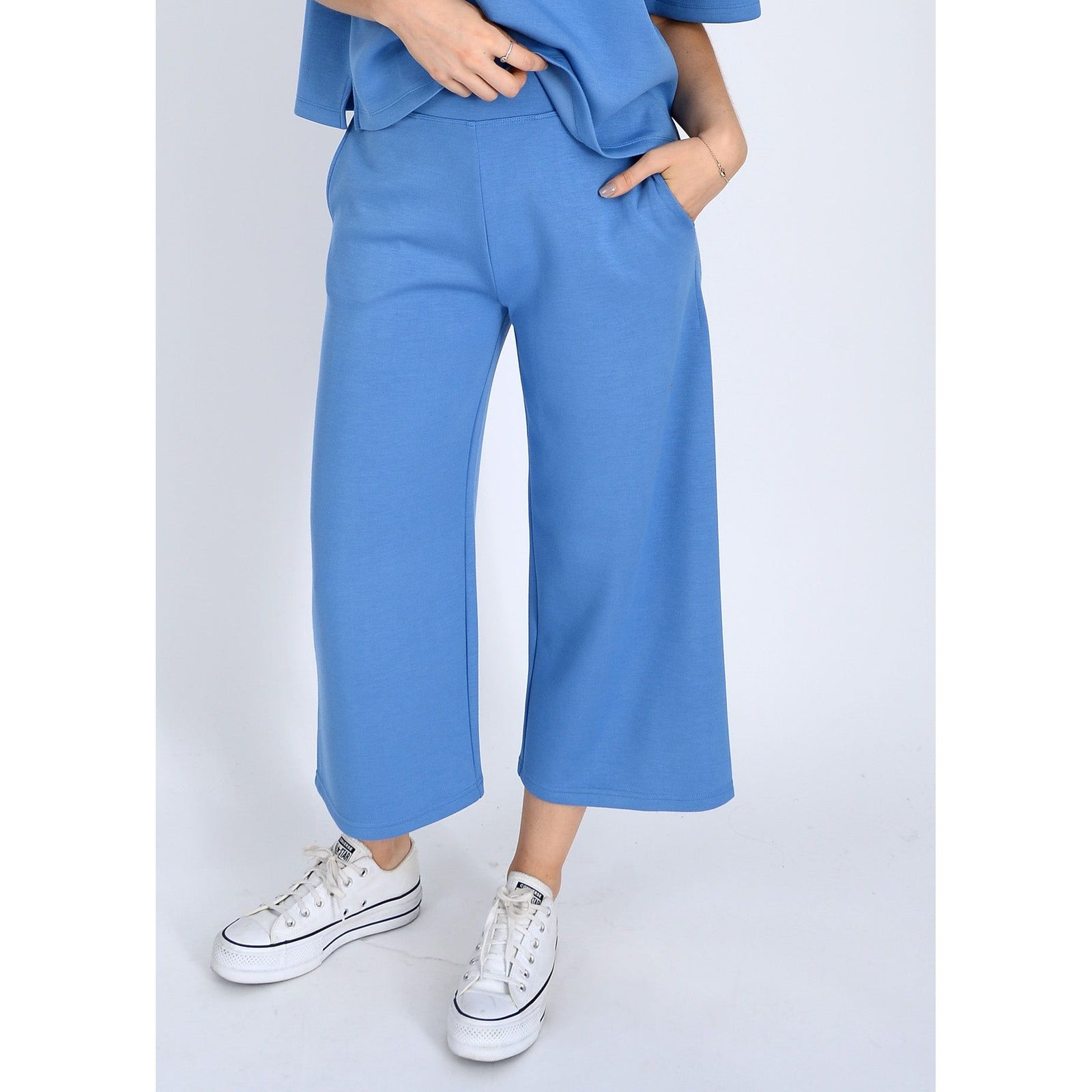Scuba Victoria Soft Knit Cropped Pants in blue, offering comfort with wide legs and pockets for everyday wear.