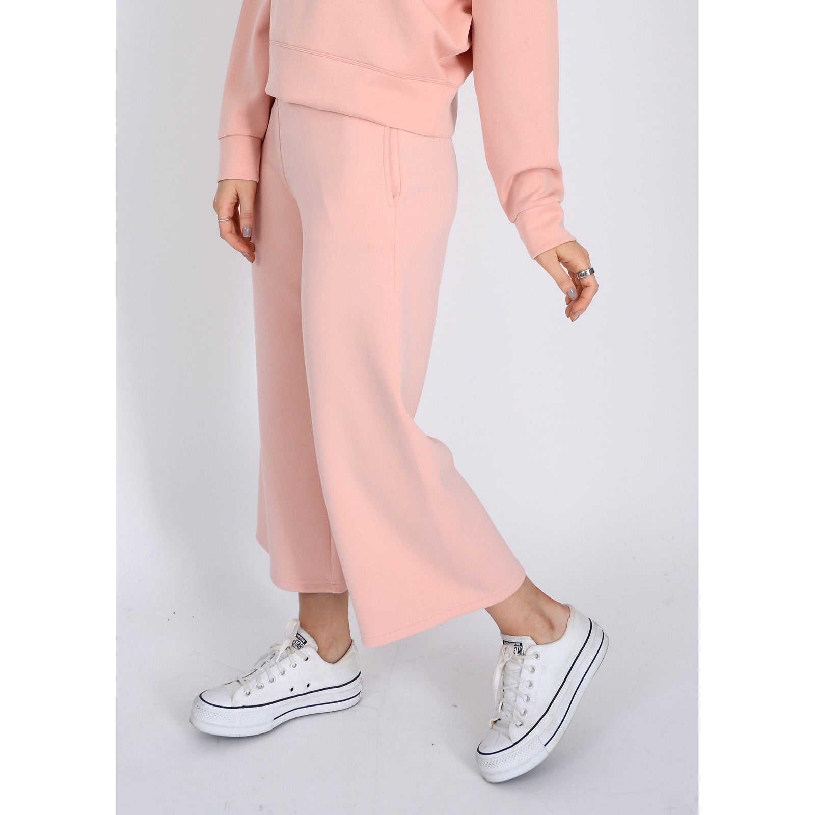 Scuba Victoria Soft Knit Cropped Pants in dusty peach, featuring a wide leg and pockets for ultimate comfort.