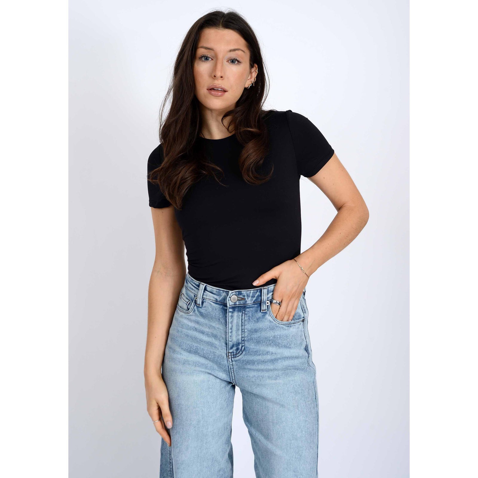 Second Skin Roxi 23 Crewneck TShirt by RD Style on a model in a black crewneck tee with jeans.