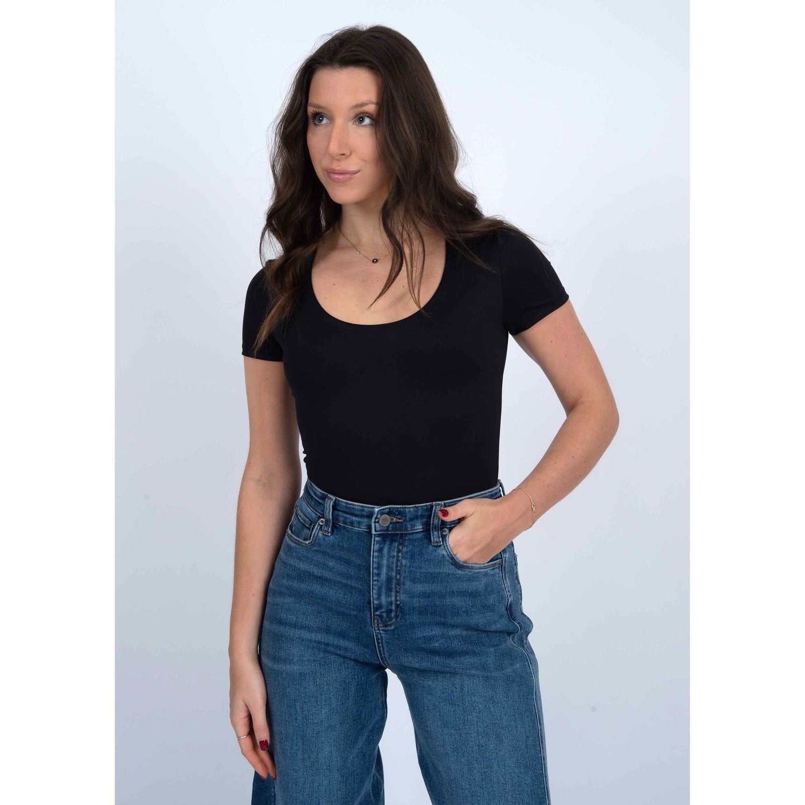 Chic and versatile, the Second Skin Sue Scoop Cap Sleeve Body Suit by RD Style is perfect for any occasion.