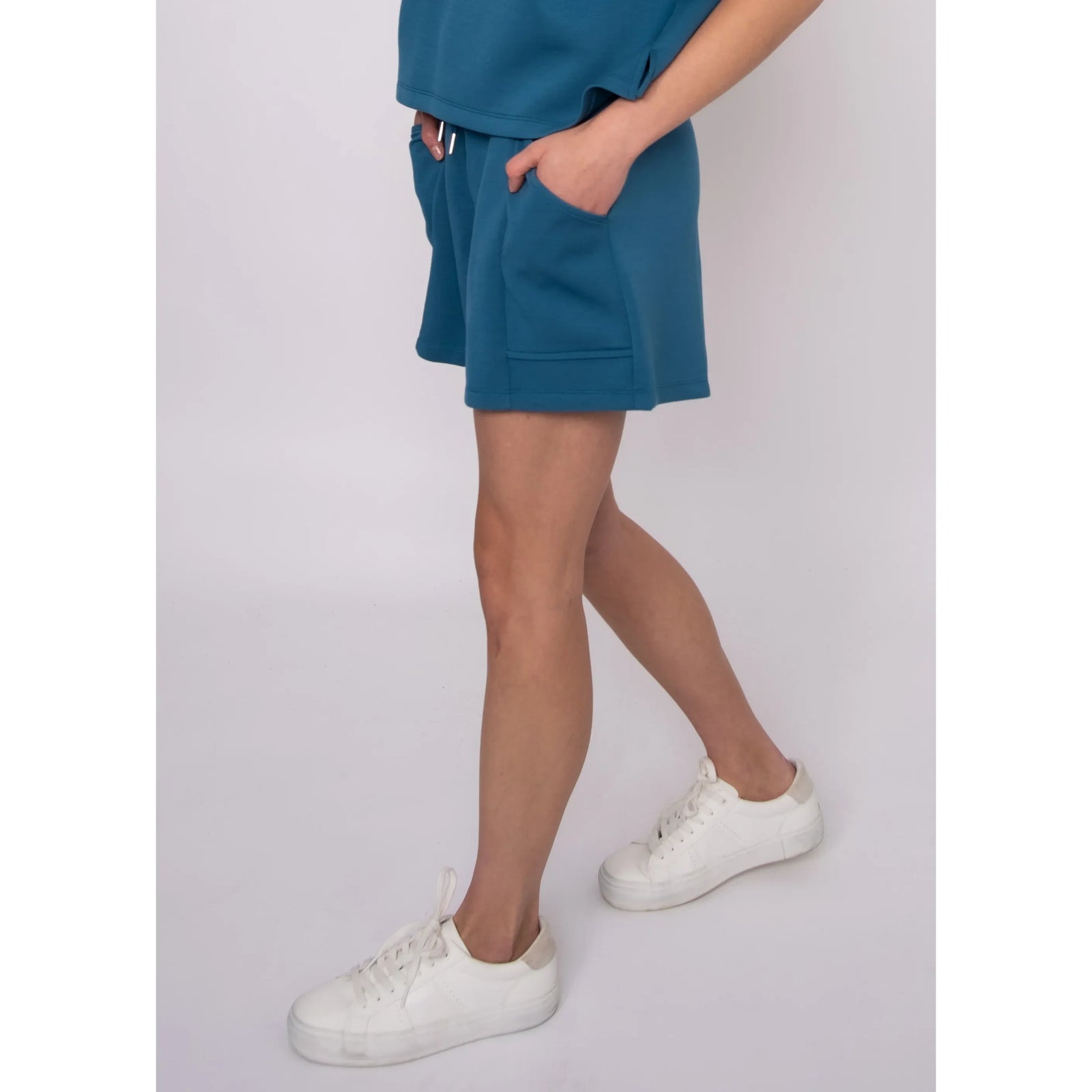 Senza Soft Knit Shorts in teal with pockets, model Sharlen 5'6 wearing size small, lounging weekend look