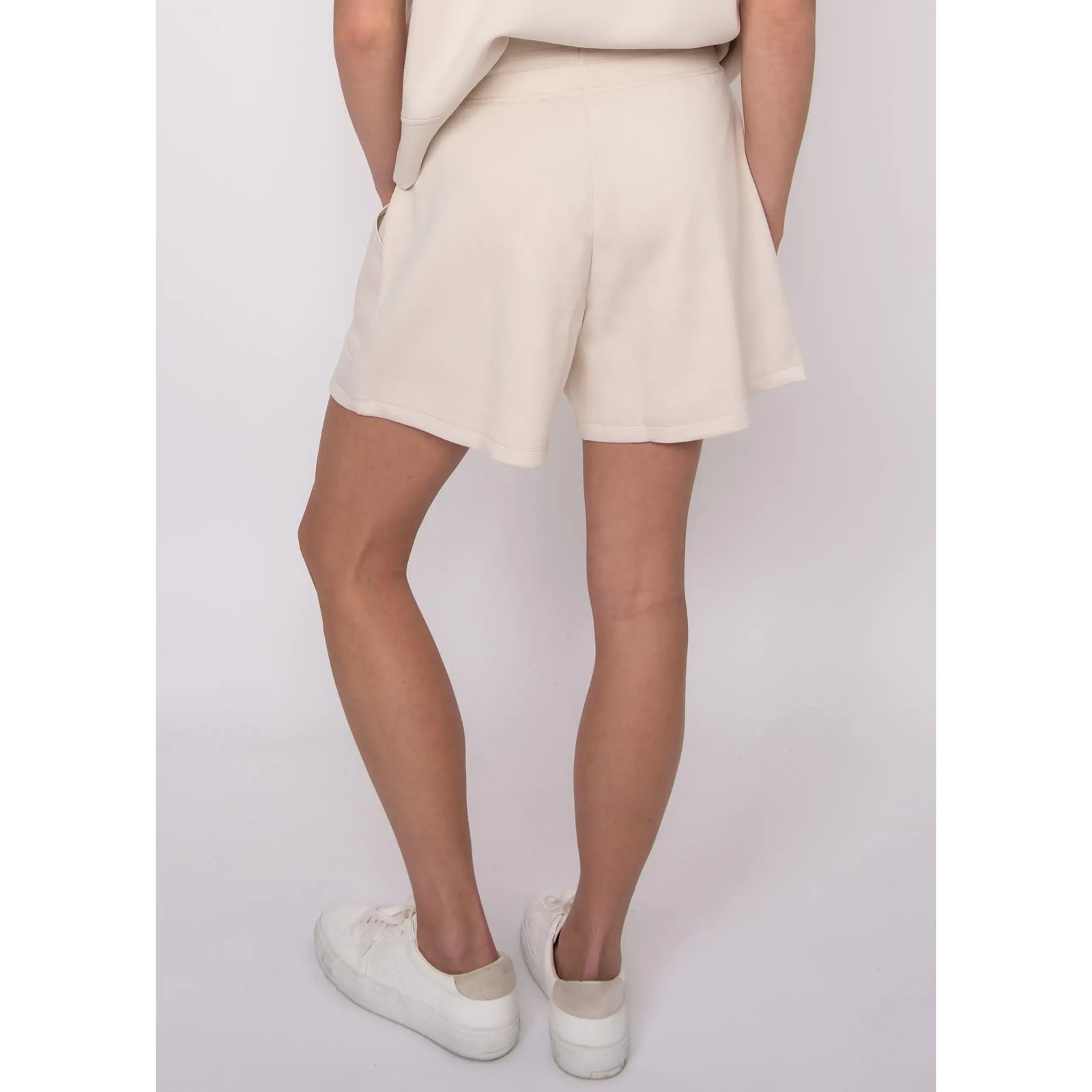 Beige Senza Soft Knit Shorts with pockets, lounge-ready casual weekend look.