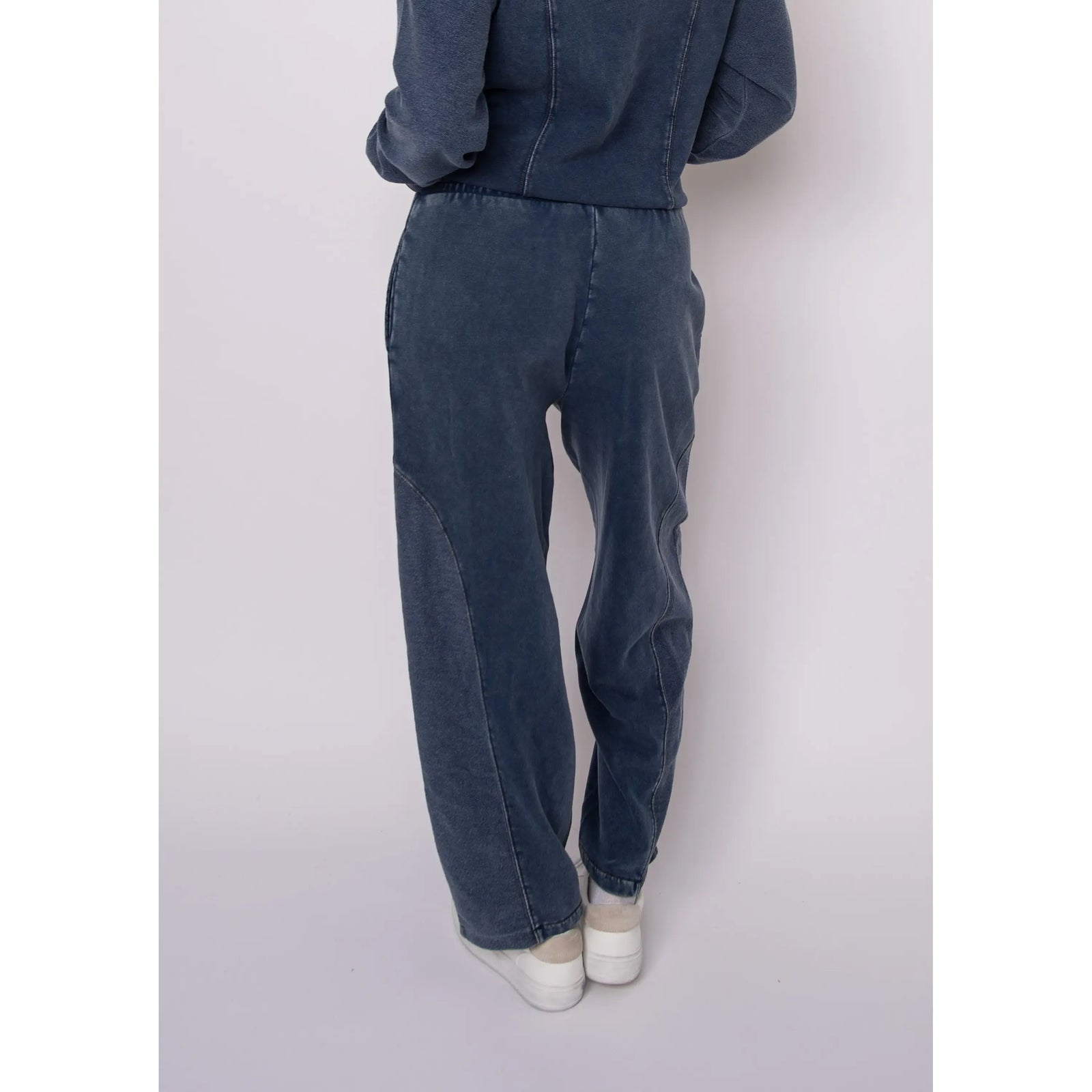 Back view of Silco French Terry Pull-On Drawstring Pants in acid-wash with relaxed wide-leg denim-inspired silhouette.