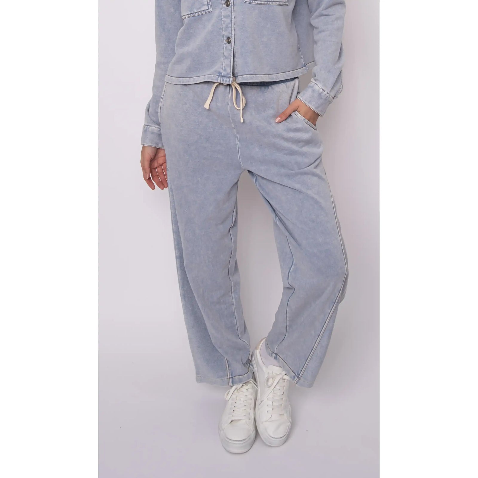 Silco French Terry pull-on drawstring pants in acid-wash light blue with a relaxed wide-leg and front pockets.