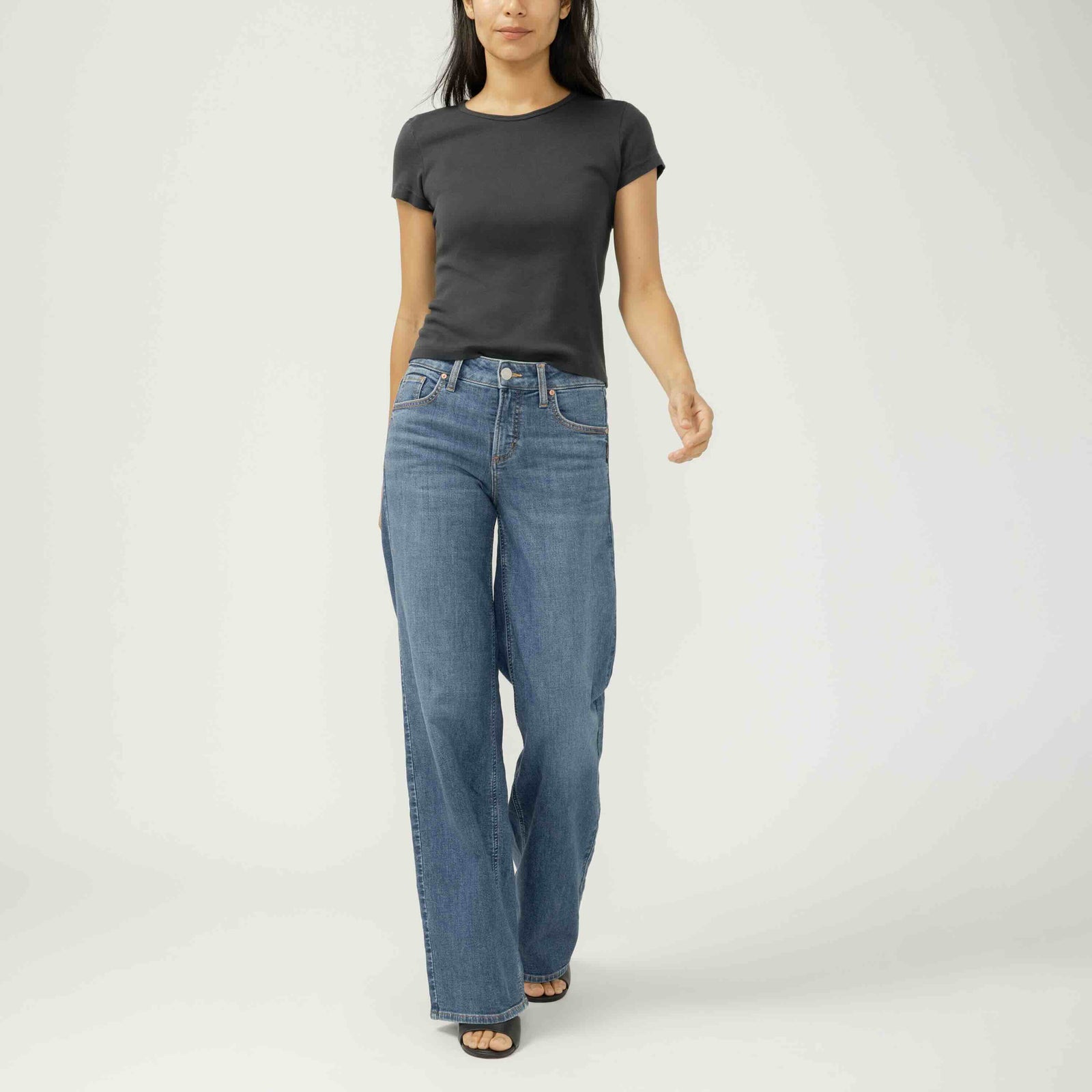 Silver Suki Wide Leg in Broydon denim on model, dark indigo with contoured waistband and wide-leg silhouette.