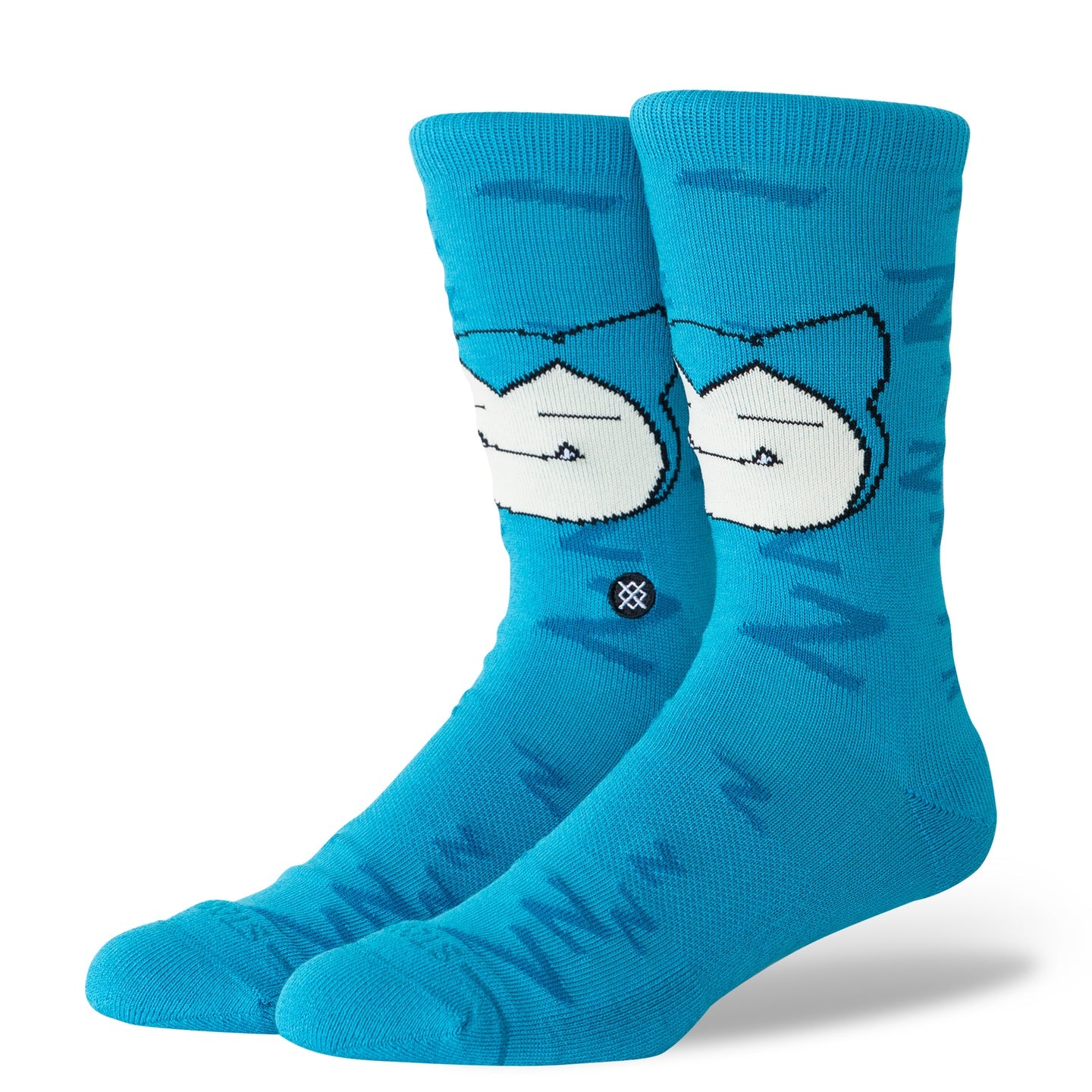 Teal Stance crew socks featuring a sleepy Snorlax face graphic and soft combed-cotton blend for comfortable napping vibes.