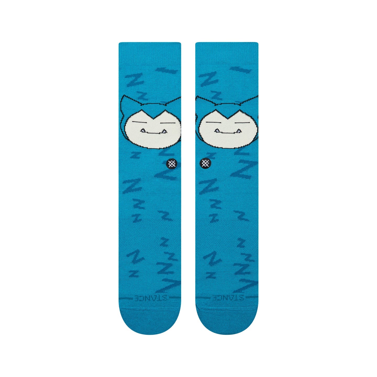 Teal Stance crew socks featuring a sleeping Snorlax face and floating Zzz patterns in a Pokémon collaboration.