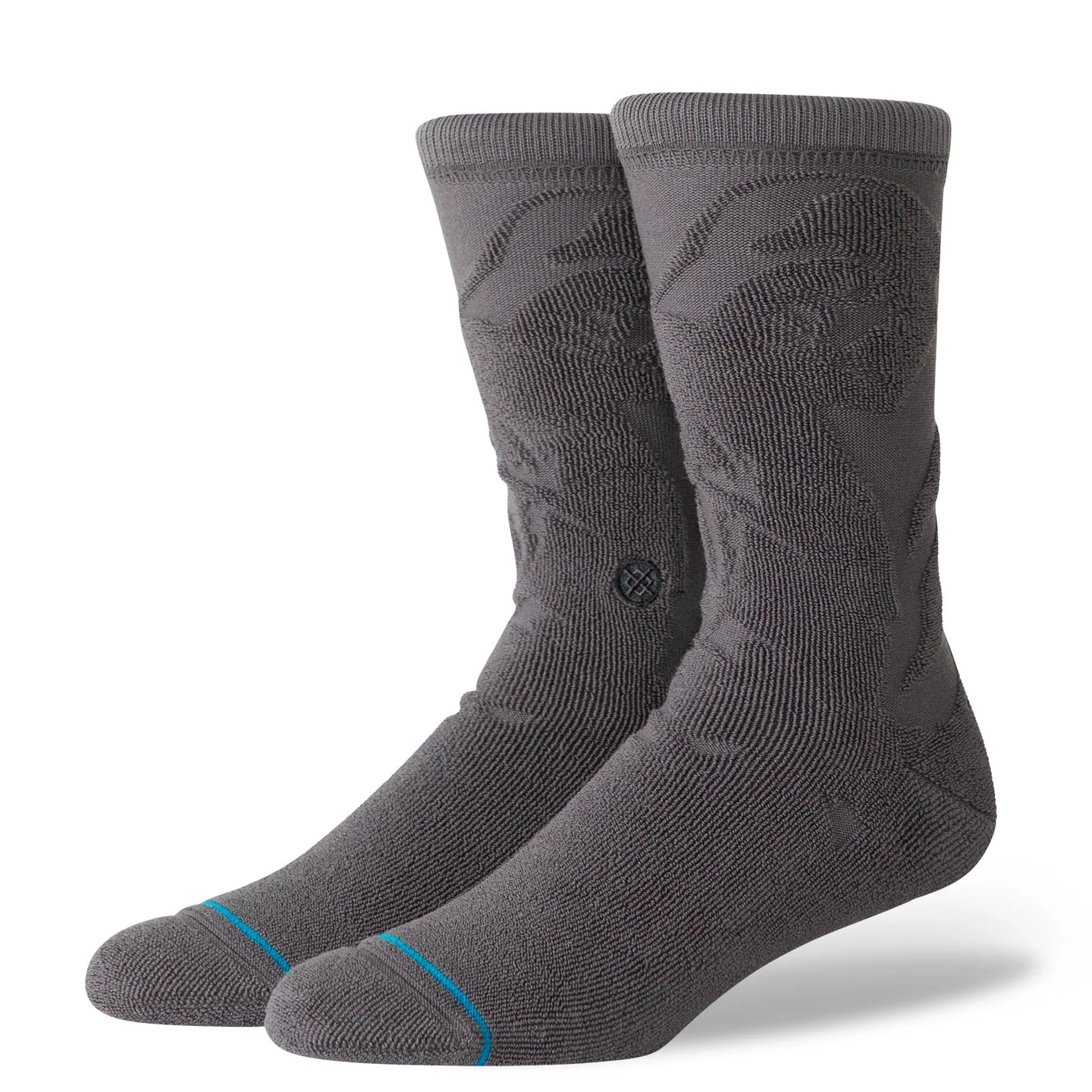 Star Wars x Stance Reverse Vader crew socks featuring a subtle embossed helmet design on a dark grey combed-cotton blend with a cyan toe accent.