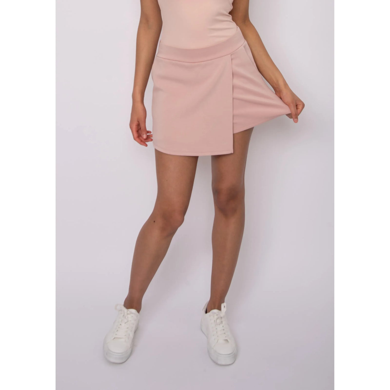 Starry Soft Knit Skort in blush pink with a wrap-over panel and comfy knit fabric.