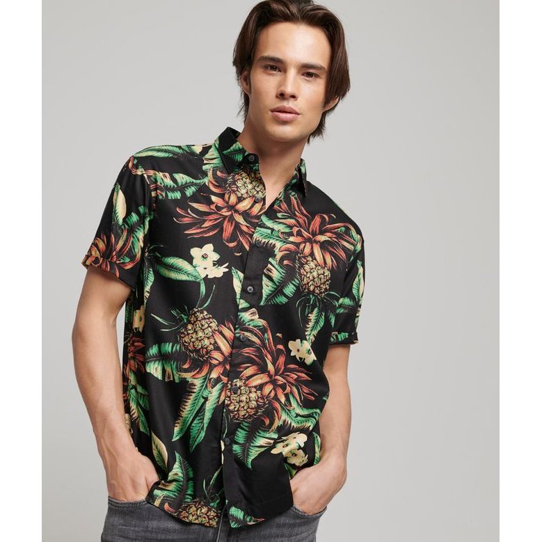 Superdry Vintage Hawaiian S/S Shirt with black base, pineapple and tropical floral print, short sleeves, relaxed fit.