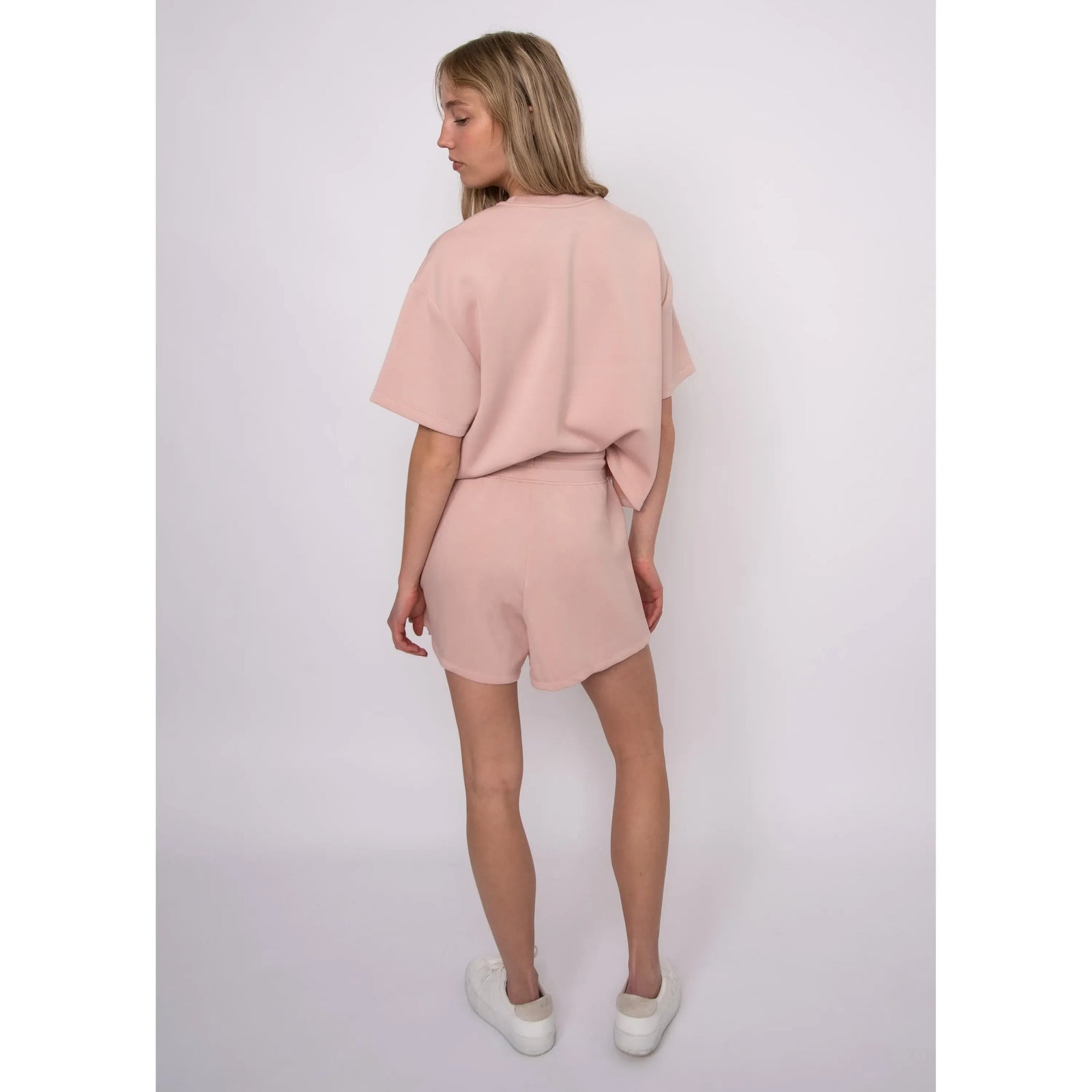 Tess Soft Knit Top in blush pink with matching shorts; boxy fit on model size Small.
