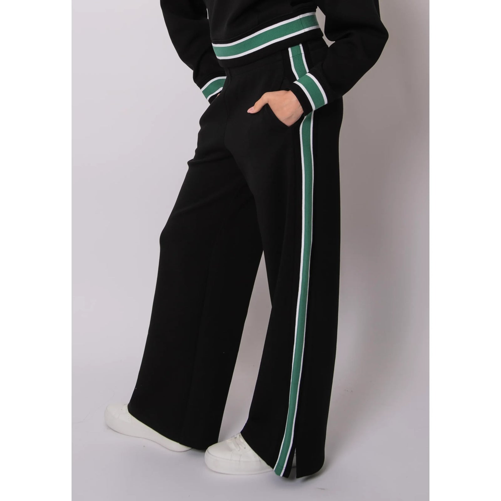 Valencia soft knit pull-on jogger pants with green and white side stripe on black fabric.
