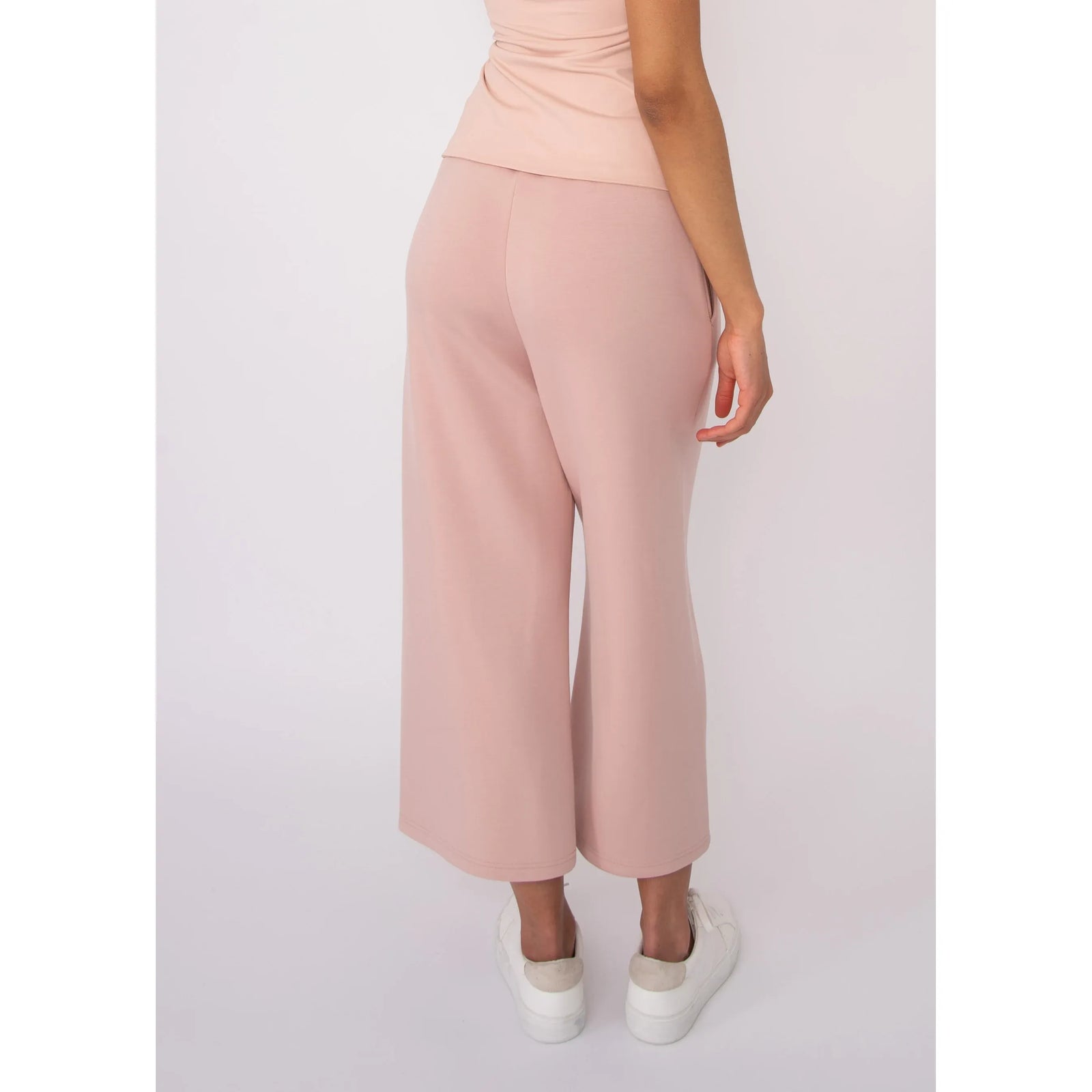 Victoria Soft Knit Cropped Pants in blush pink with a wide leg and pockets, worn by Sharlene in size Small