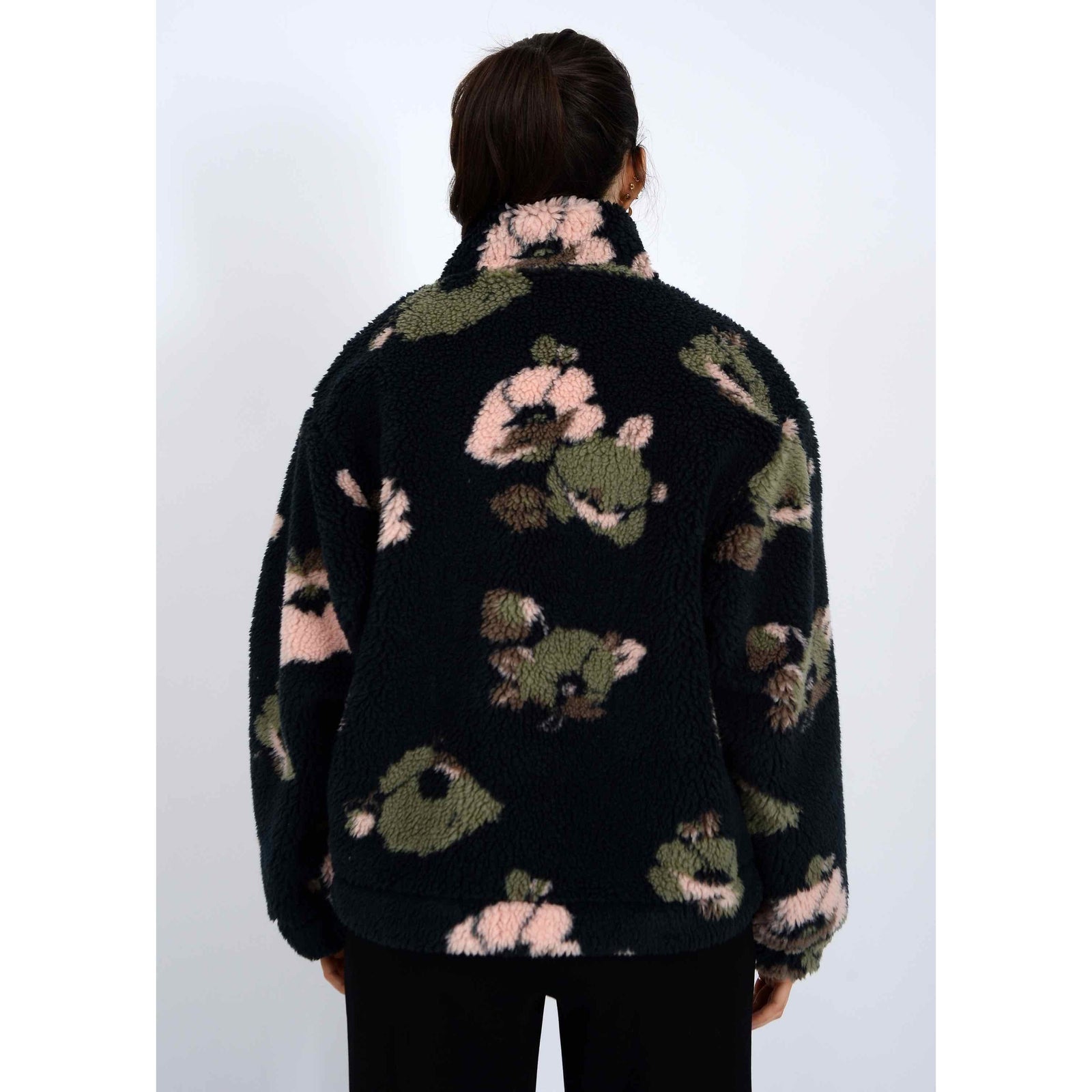 Whistler Sherpa Jacket: back view of black sherpa with pink and olive floral print and a mock collar.