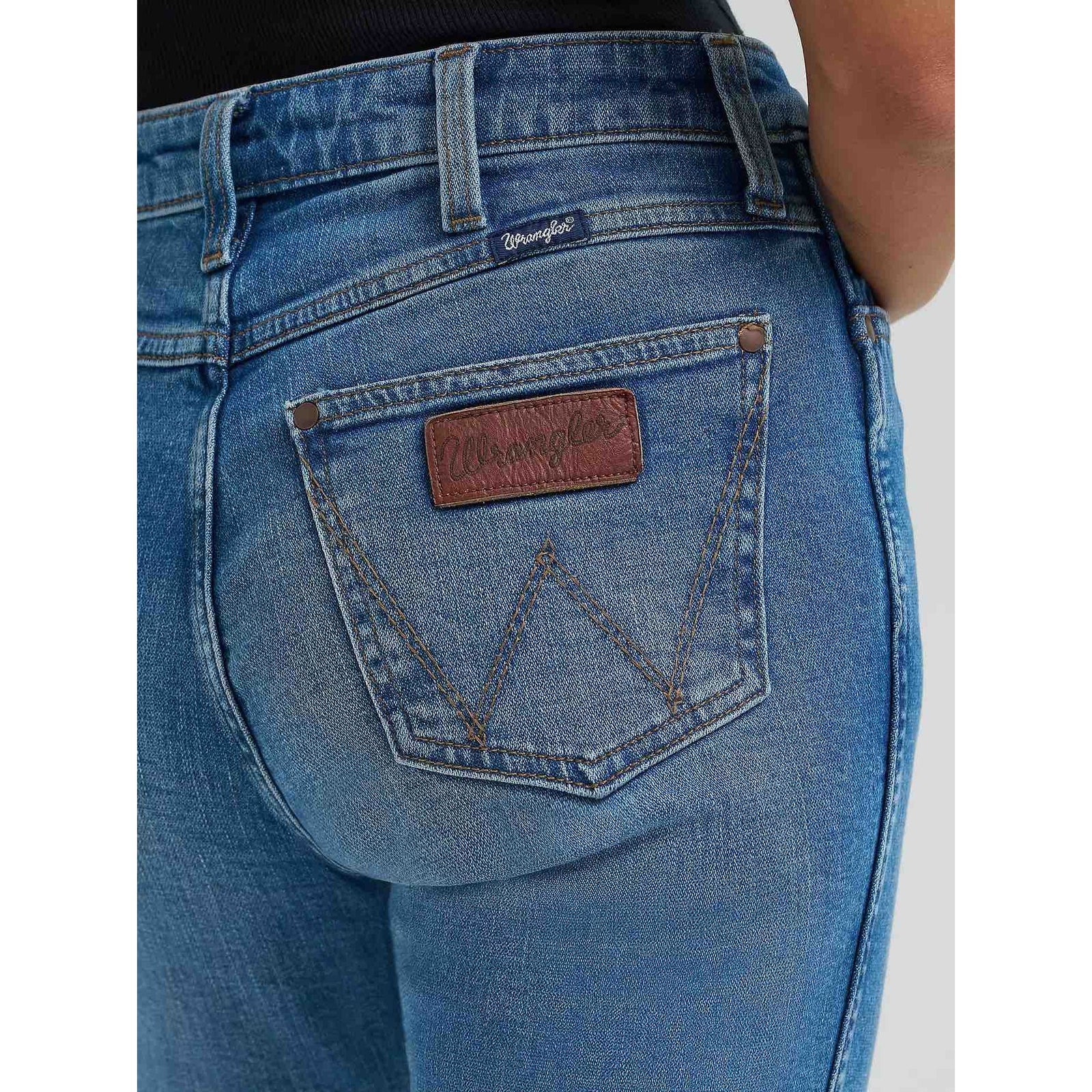 Women's Wrangler Retro Bailey High Rise Bootcut Jean with streamlined fit and 17-inch boot flare to fit over boots.