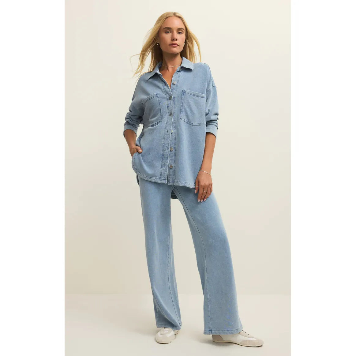 Model wearing Z Supply All Day Knit Denim Jacket with matching light-wash denim pants.