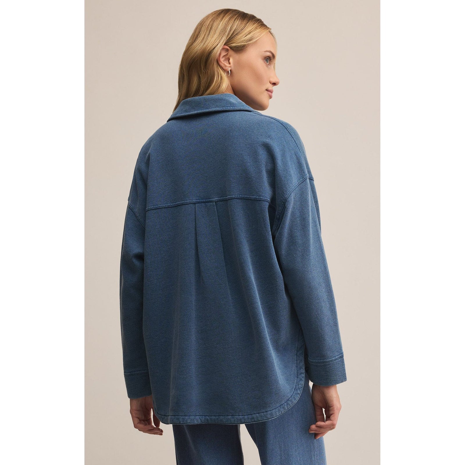 Z Supply All Day Knit Denim Jacket in blue knit denim, back view.