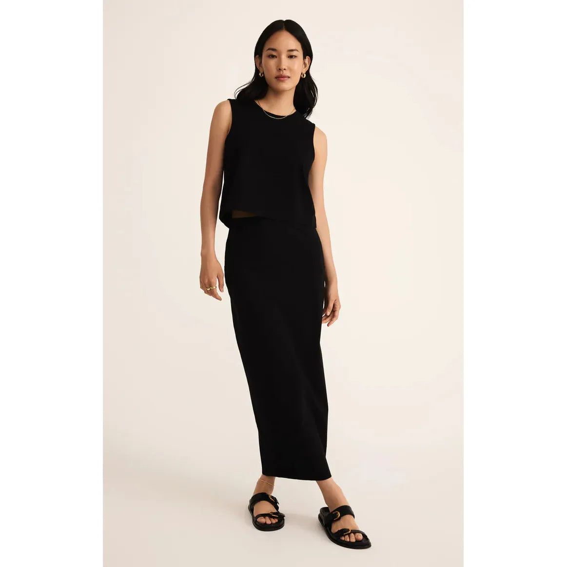 Z Supply Gail Jersey Denim Midi Skirt in true black on model, elastic waist and sleek midi silhouette