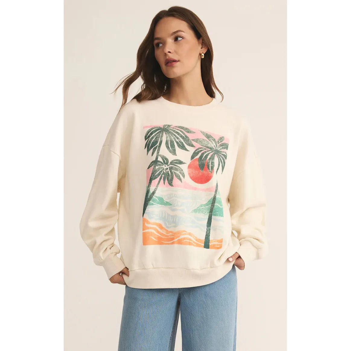 Cozy up in the Z Supply High Tide Sunday Sweatshirt, featuring a vibrant beach print for laid-back vibes.