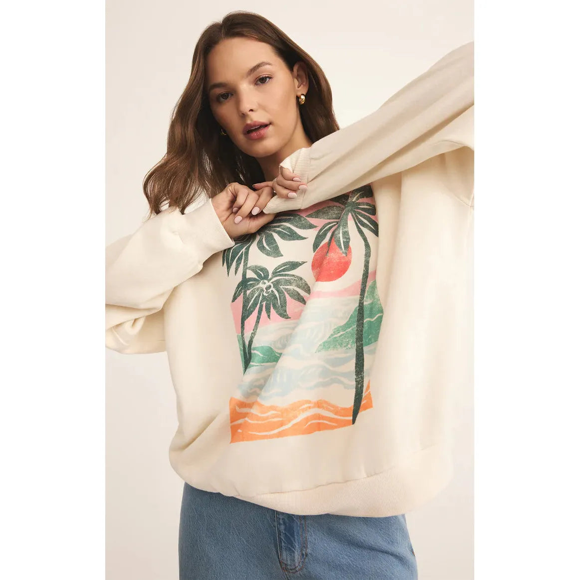 Cozy up in the Z Supply High Tide Sunday Sweatshirt featuring a vibrant beach-inspired design for laid-back vibes.