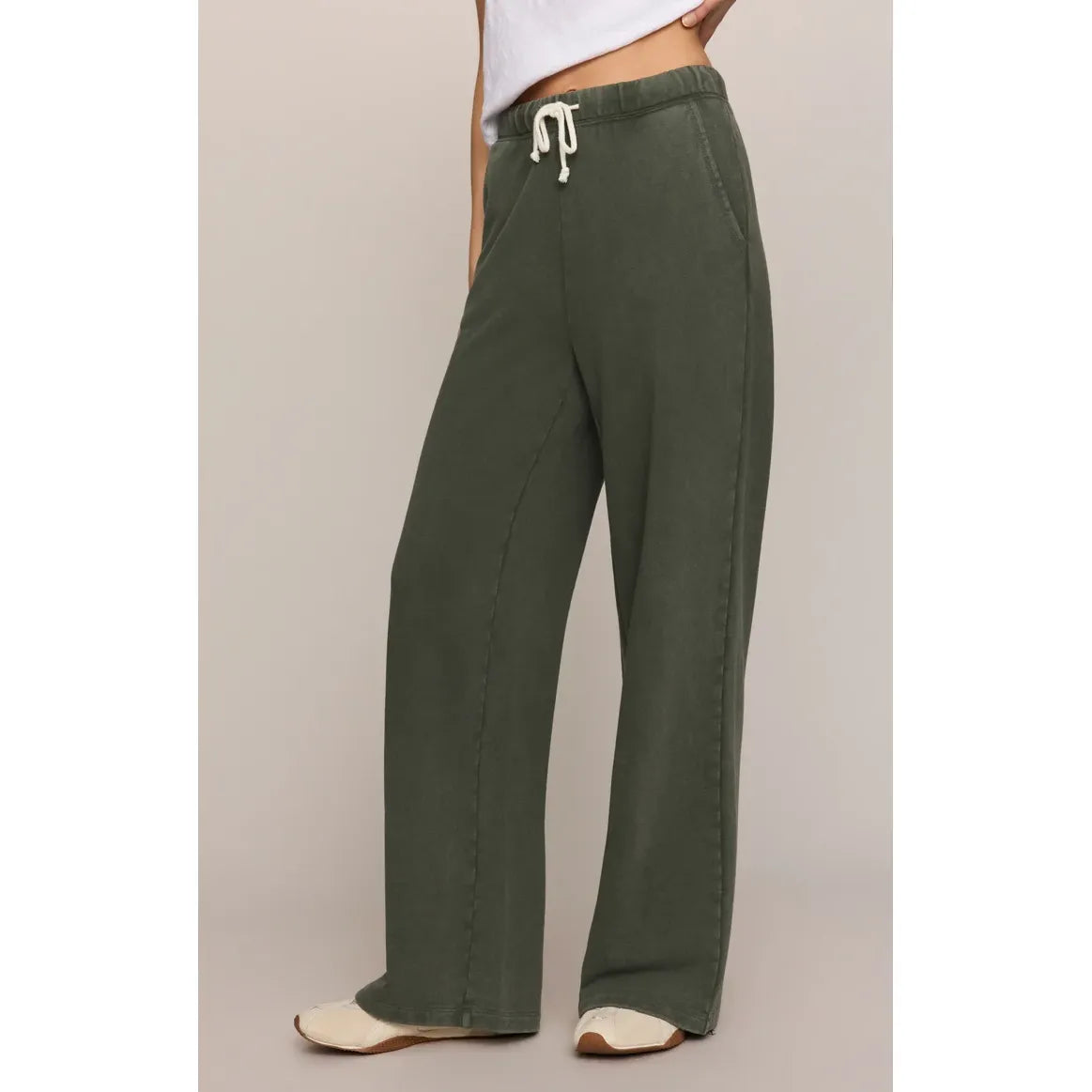 olive green Hunter knit pants with white drawstring, wide-leg French terry design, slash pockets, and relaxed comfort fit.