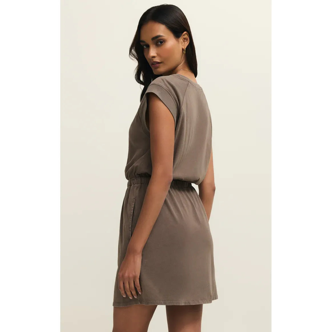 Z Supply Kalani Mini Dress in taupe cotton jersey, relaxed fit with elastic waistband, worn by model
