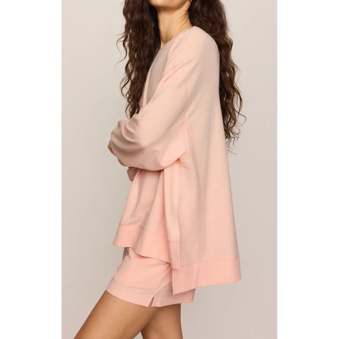 Blush pink Z Supply Modern Weekender Sweatshirt on model; relaxed oversized crewneck in buttery soft baby French terry.