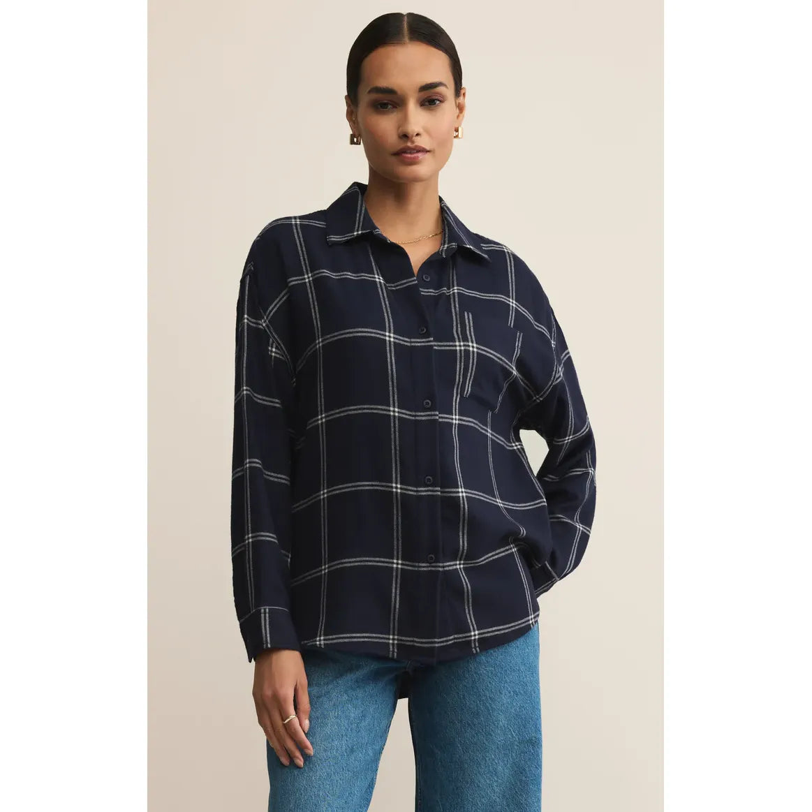 Z Supply River Plaid Button Up Top, navy with white grid, modeled by Sharlene in size small, paired with jeans.
