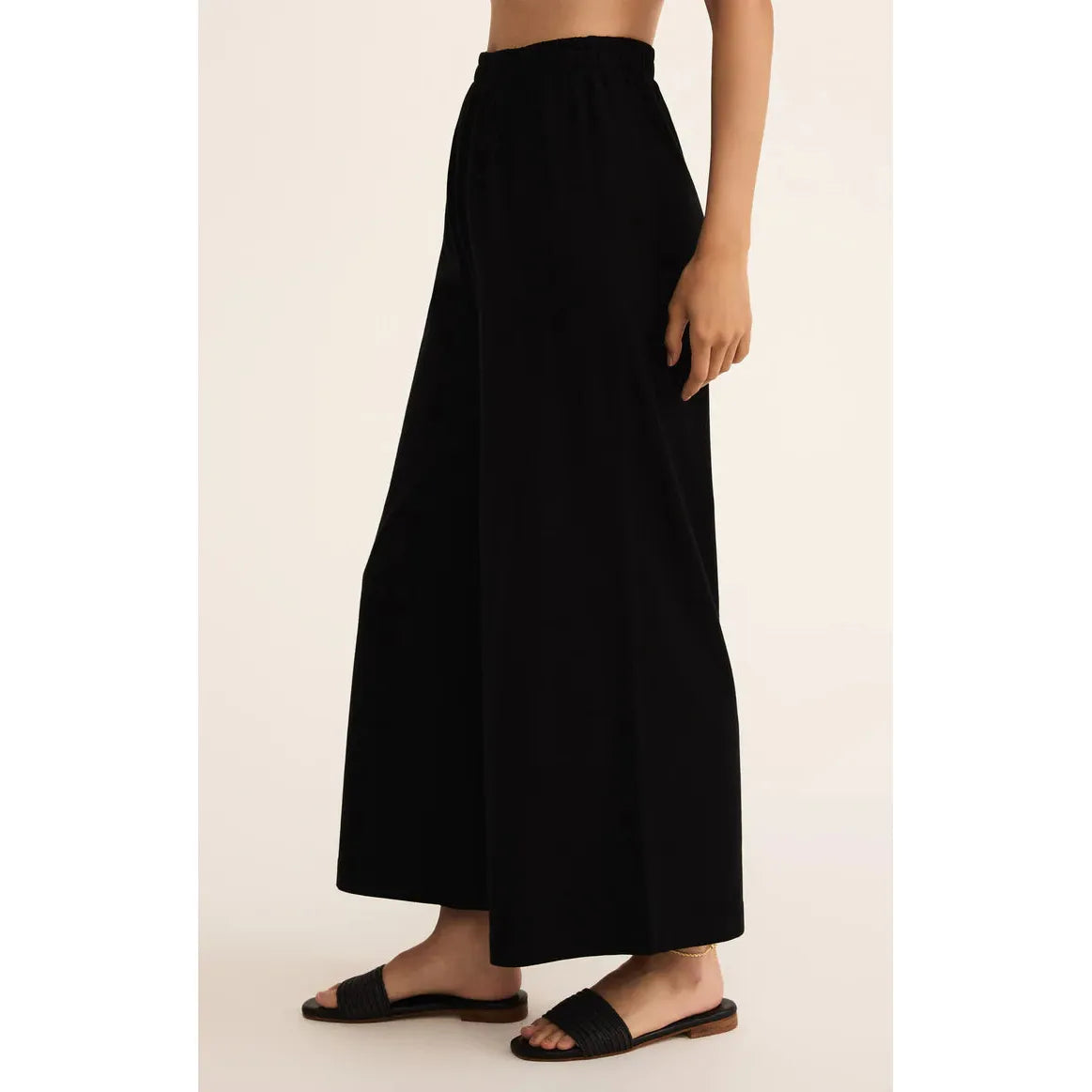 Z Supply Scout Jersey Flare Pant in black, high-rise, relaxed-fit crop flare with elastic pull-on waist.