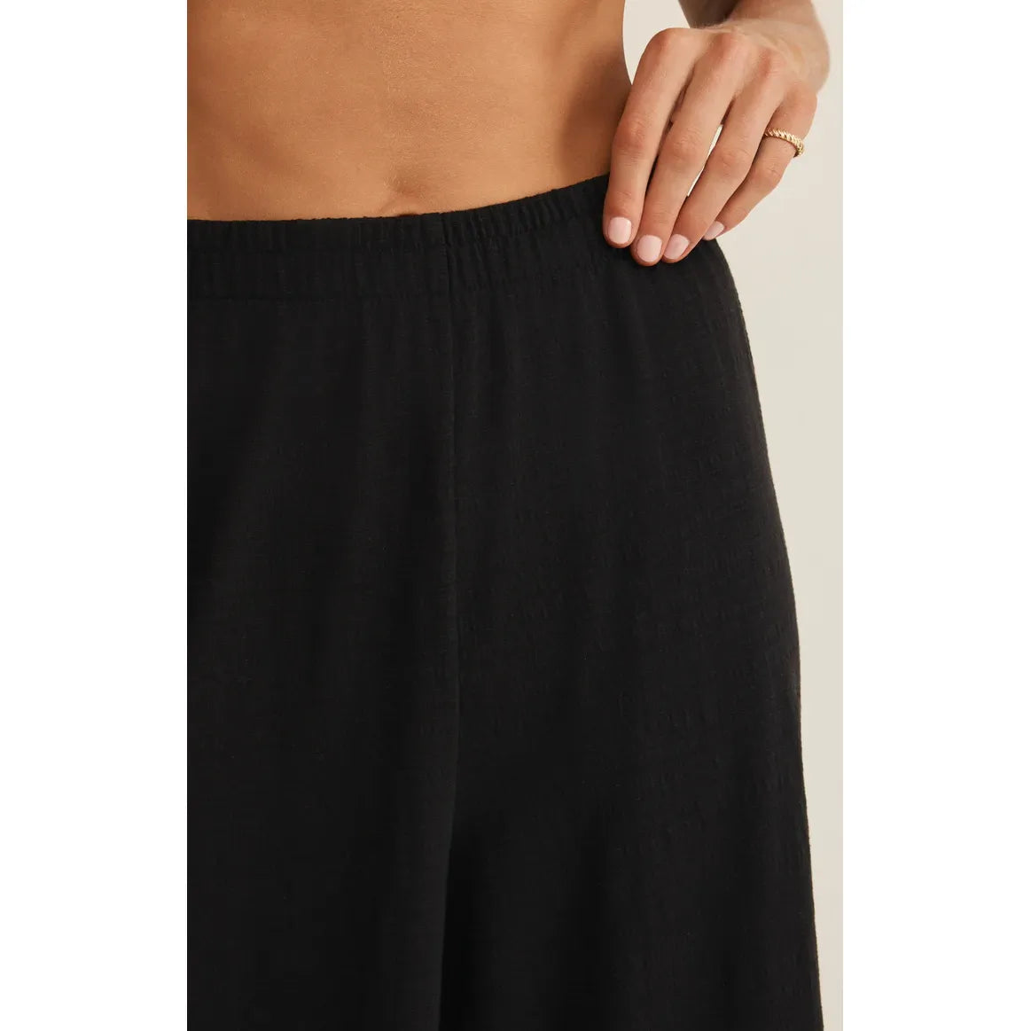 Z Supply Scout Textured Slub Pant in black, high-rise with elastic waistband, ankle-length.