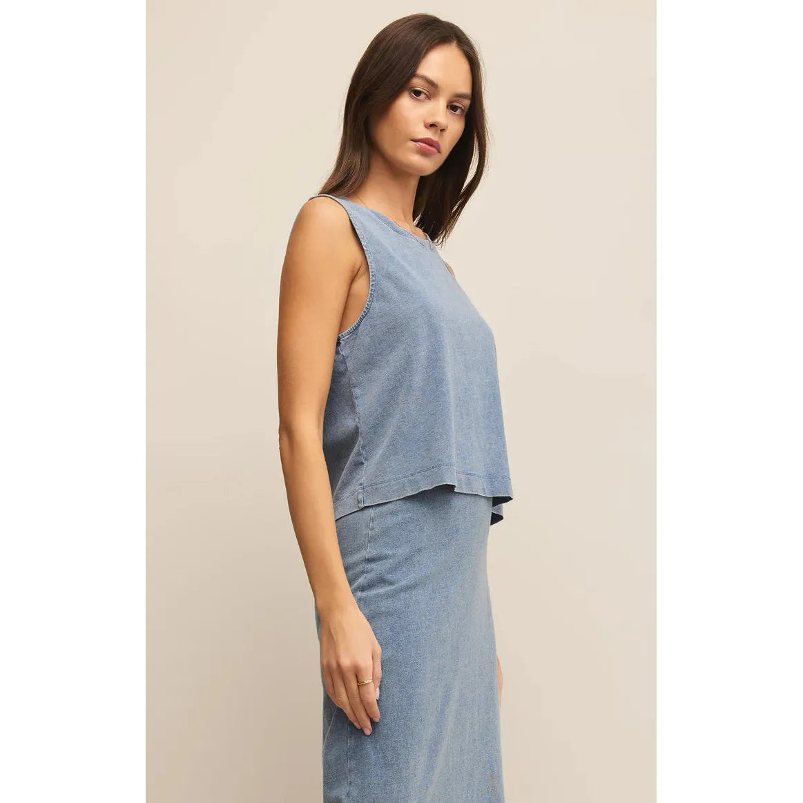 Z Supply Sloane Washed Jersey Tank in medium indigo offers a soft, stylish denim look perfect for elevating casual outfits.