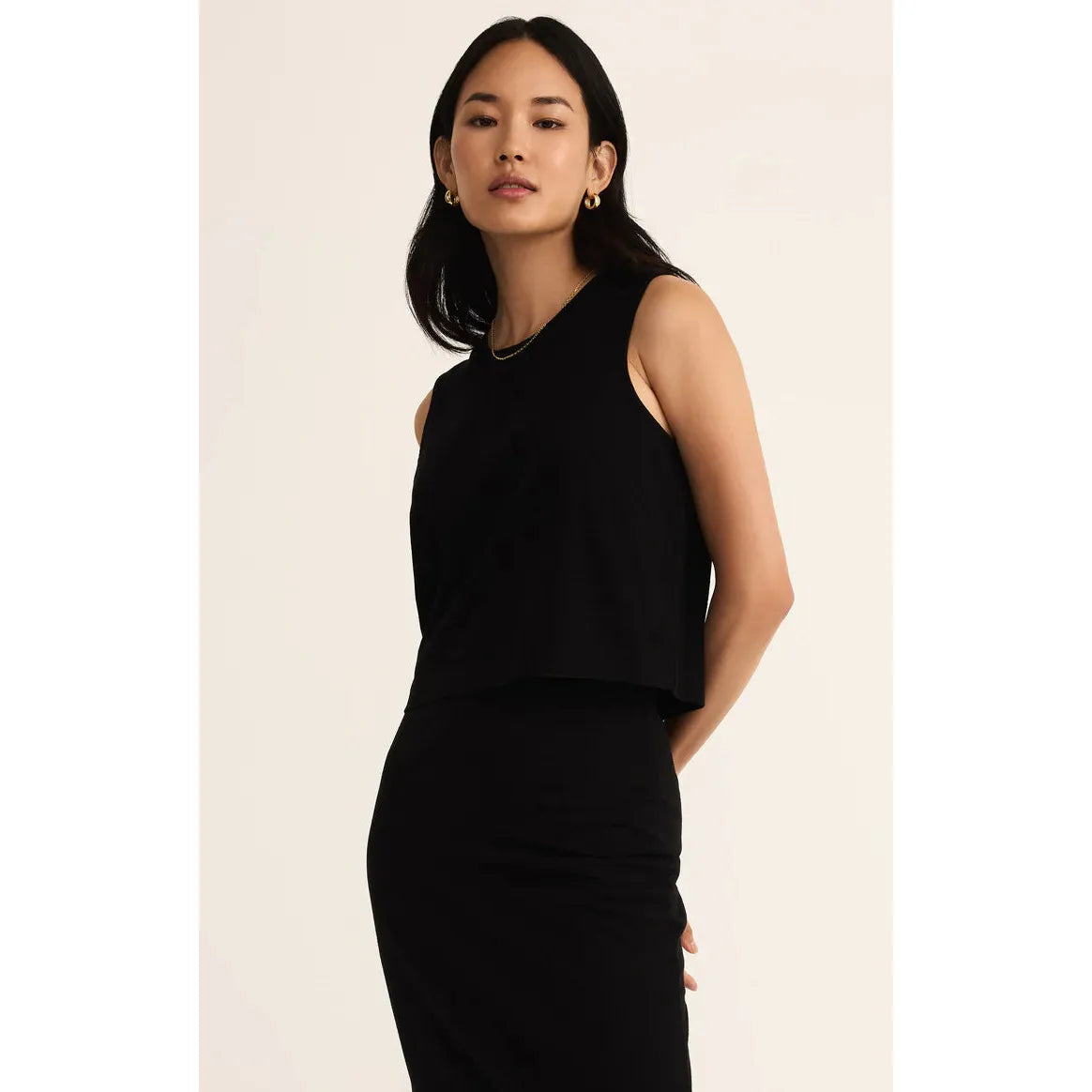 Elevate your wardrobe with the Z Supply Sloane Muscle Jersey Tank, featuring a relaxed fit and soft, lightweight fabric.