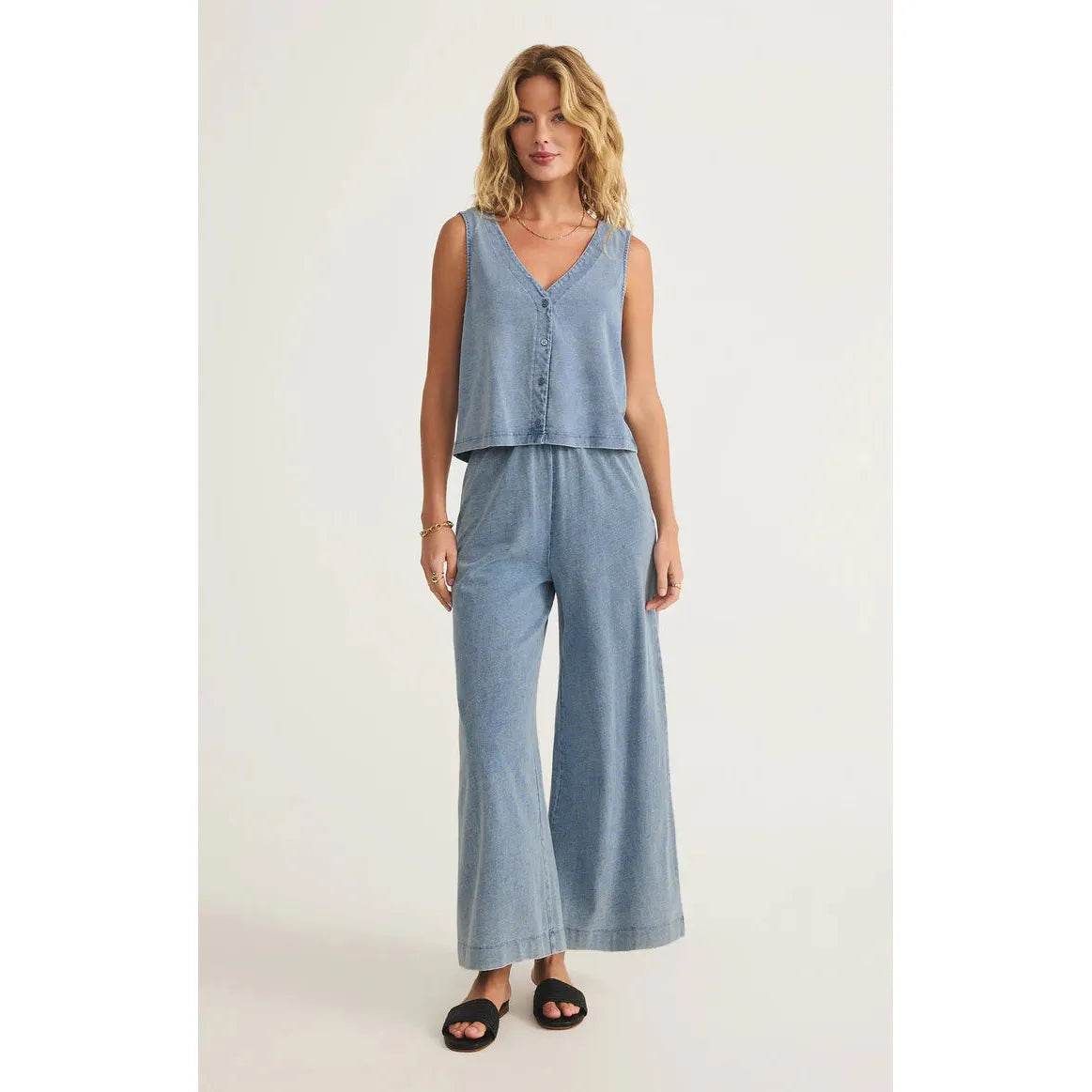 Z Supply Solace V-Neck Jersey Denim Tank offers vintage vibes and comfort with its relaxed fit and button-front design.