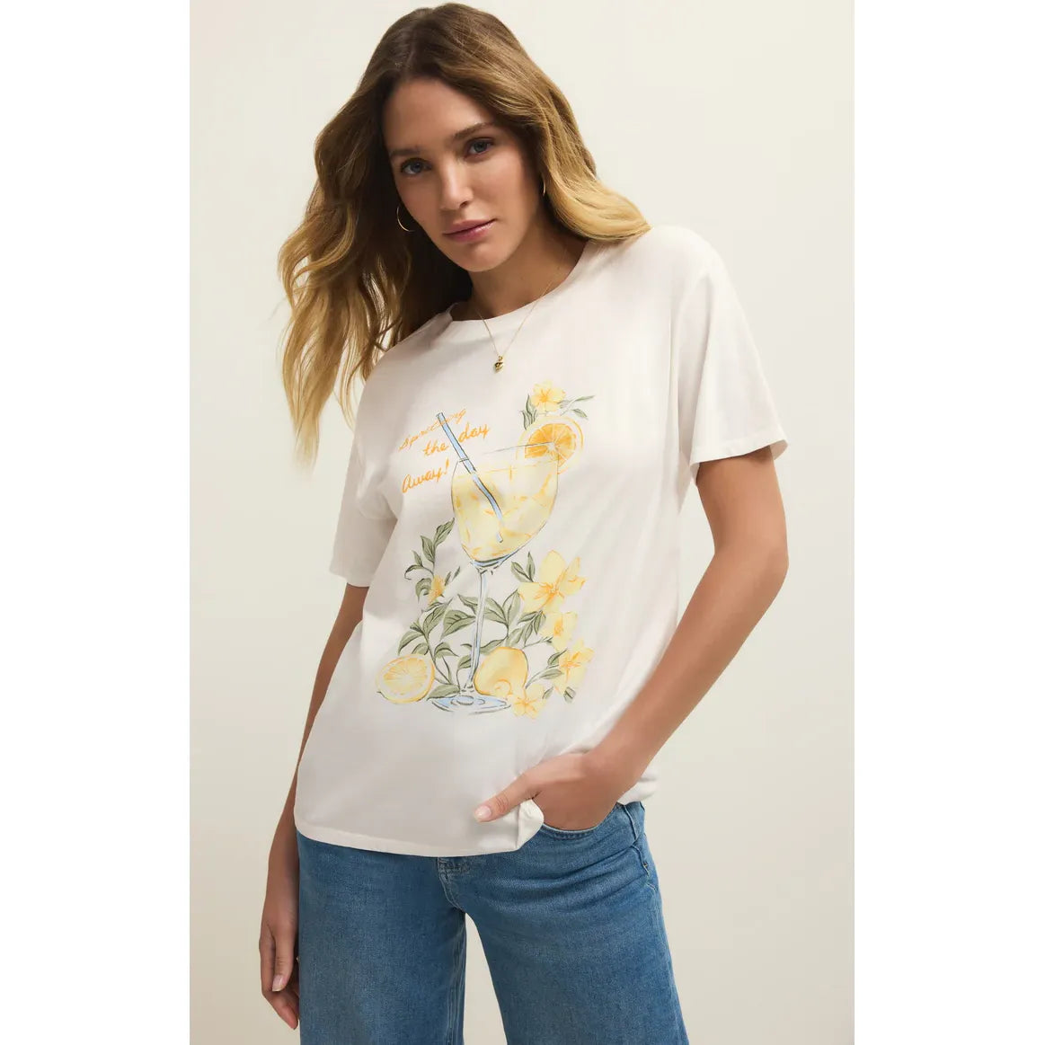 Model wearing Z Supply Spritz Boyfriend Tee in white cotton jersey with citrus spritz graphic, relaxed fit.