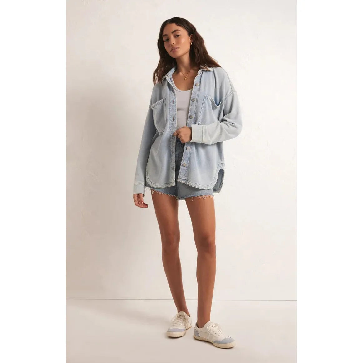 Z Supply All Day Knit Denim Jacket styled with shorts, showcasing a soft French terry denim look perfect for layering.