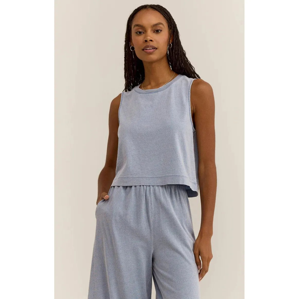 Elevate your style with the Z Supply Sloane Washed Jersey Tank, featuring a lightweight, denim-inspired design.