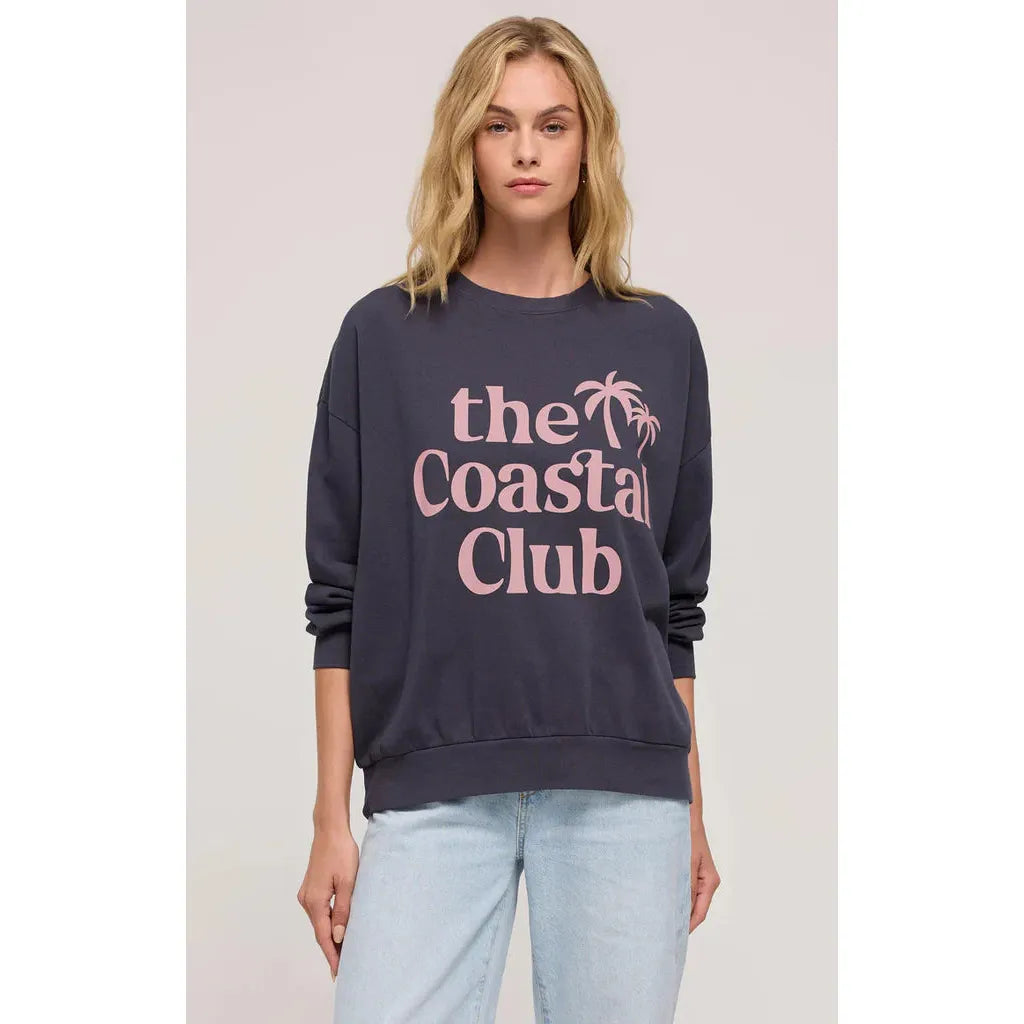 Z Supply Coastal Club Sunday Sweat Shirt features a palm tree graphic and soft cotton fleece for ultimate comfort.