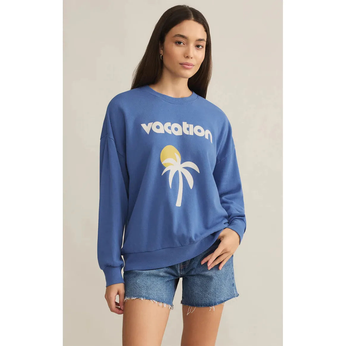 Luxuriously oversized Z Supply Vacay Sunday Sweat Shirt featuring a "Vacation" graphic for effortless sunny-day style.