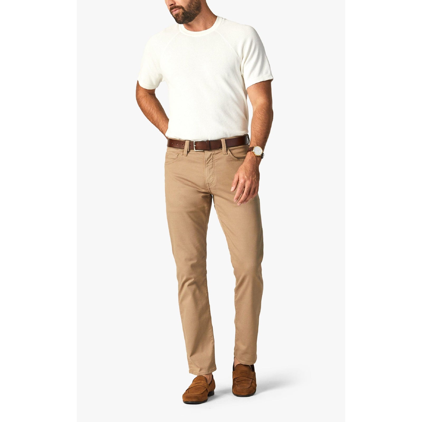 34 Heritage Courage Khaki Summer CoolMax Pants worn by a man in khaki chinos with brown belt and tan loafers