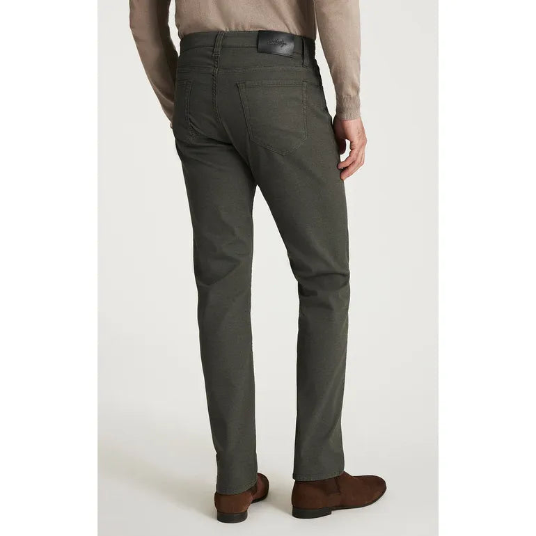 Back view of a man wearing 34 Heritage Courage Peat Coolmax Pants in peat color with brown shoes.